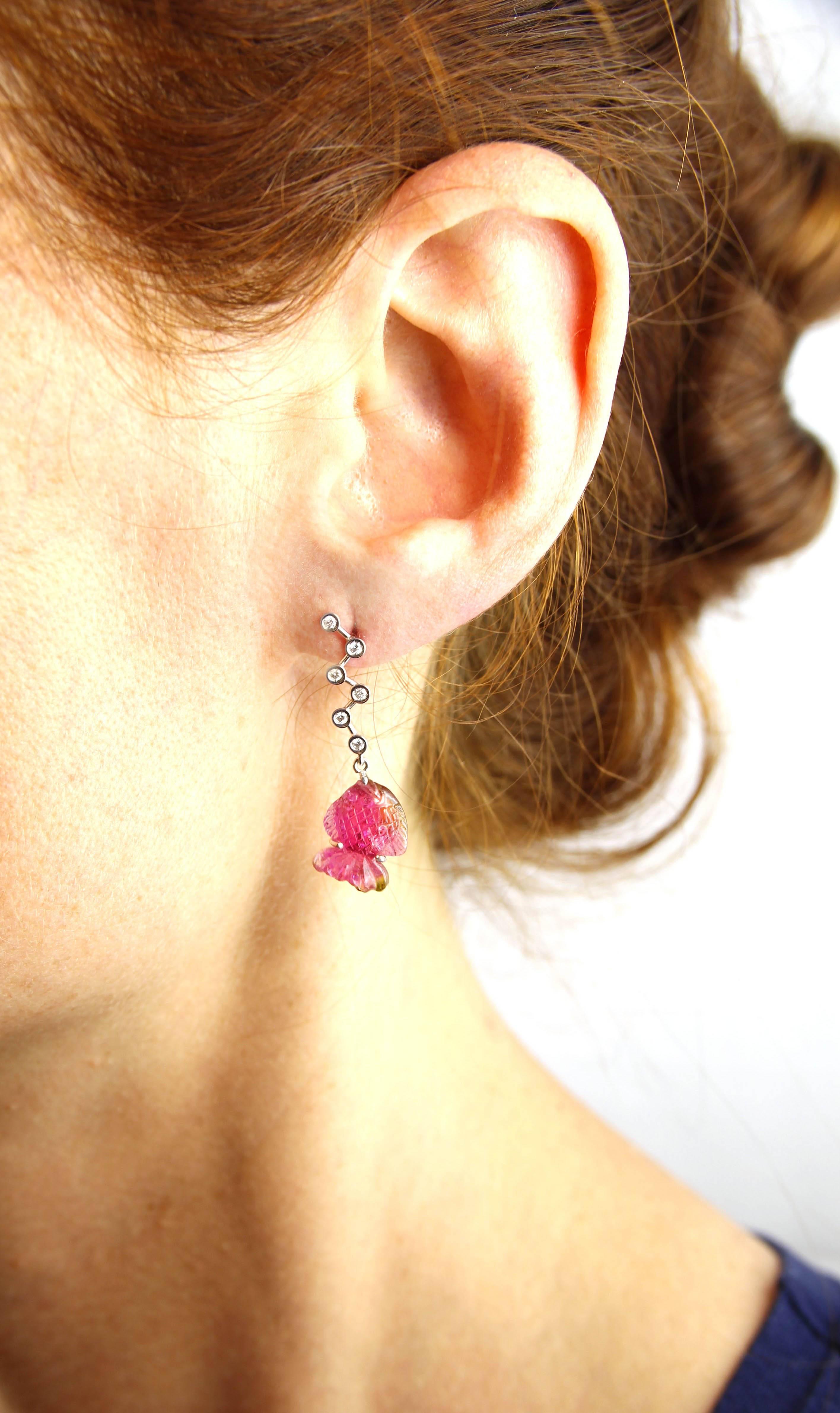 Jona design collection, hand crafted in Italy, 18 karat white gold dangle earrings, consisting of 2 fish-carved pink tourmalines, hanging from 0.13 carats of white diamond bubbles. 
All Jona jewelry is new and has never been previously owned or