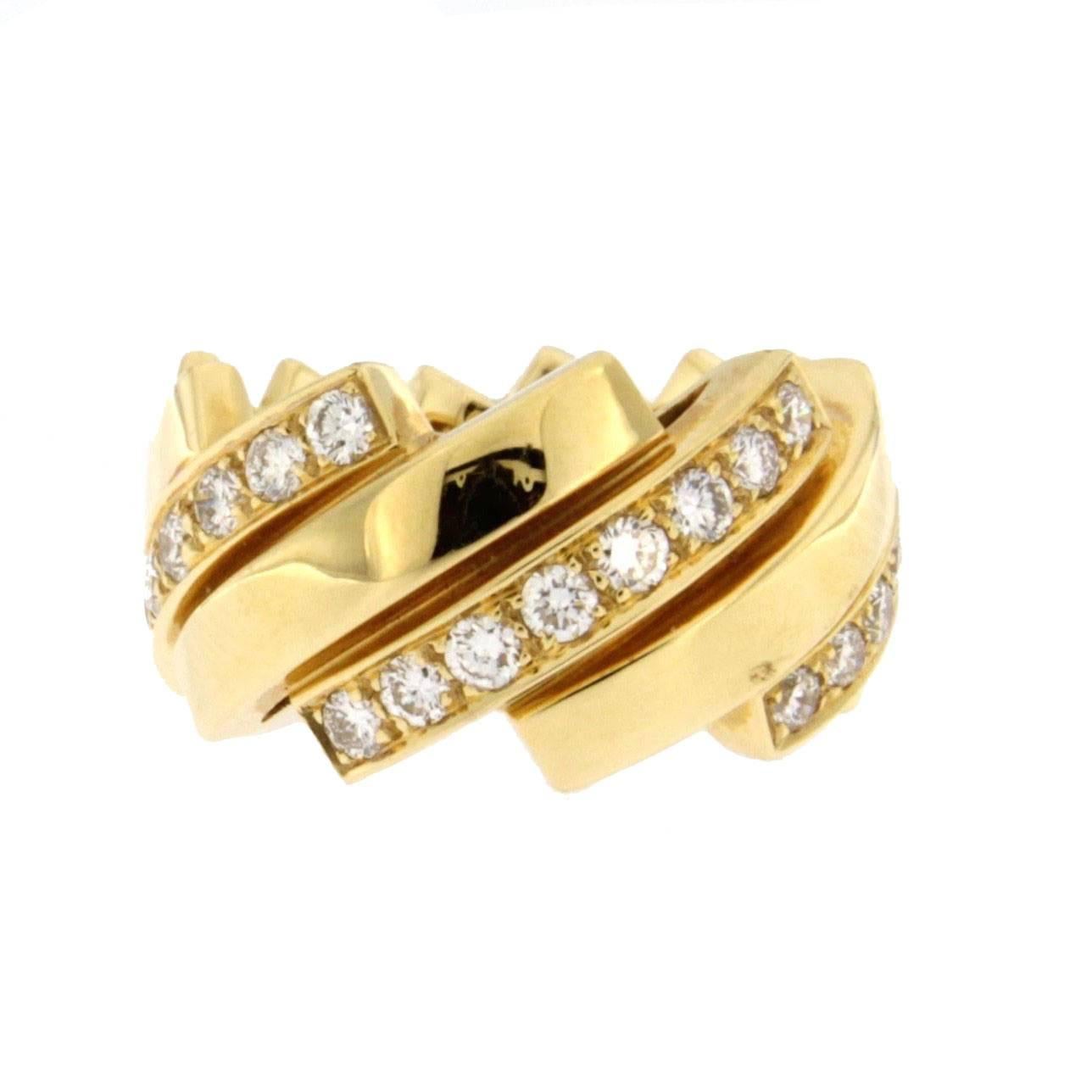 Alex Jona design collection, hand crafted in Italy, 18 karat yellow gold band ring, consisting of a sequence of oblique stripes accented with white diamonds weighing 0.97 carats.  Size US 6.5, can be sized to any specification.

Alex Jona jewels