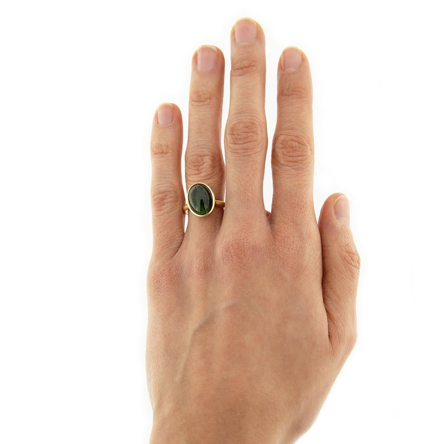 Jona design collection, hand crafted in Italy, 18 karat brushed yellow gold ring, centering a 8.85 carats green cabochon tourmaline. 
US size 5.9. It can be sized to any specification.  
All Jona jewelry is new and has never been previously owned or