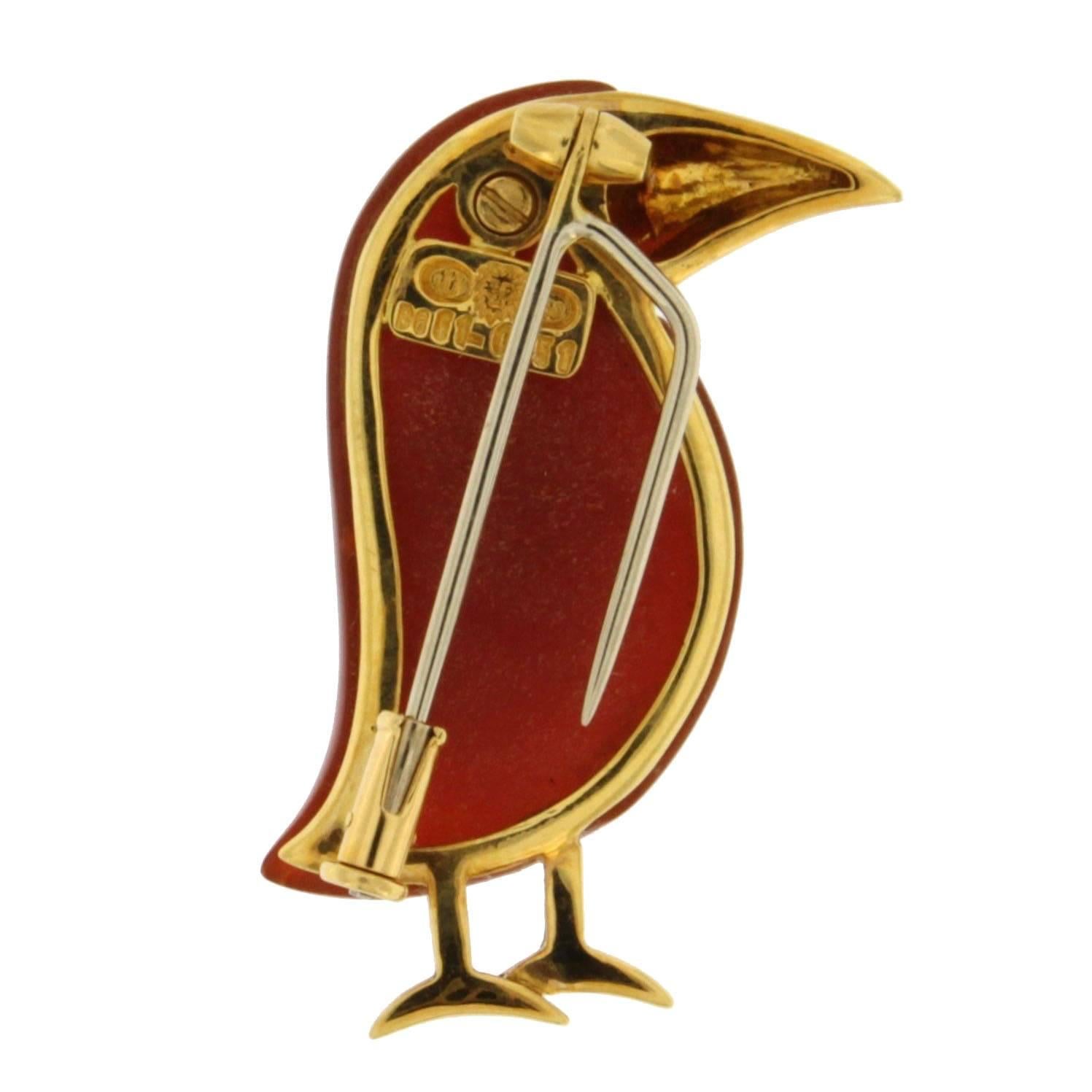 Jona design collection, 18 karat yellow gold toucan brooch, set with a carnelian body and a white diamond eye.  All Jona jewelry is new and has never been previously owned or worn. Each item will arrive at your door beautifully gift wrapped in Jona