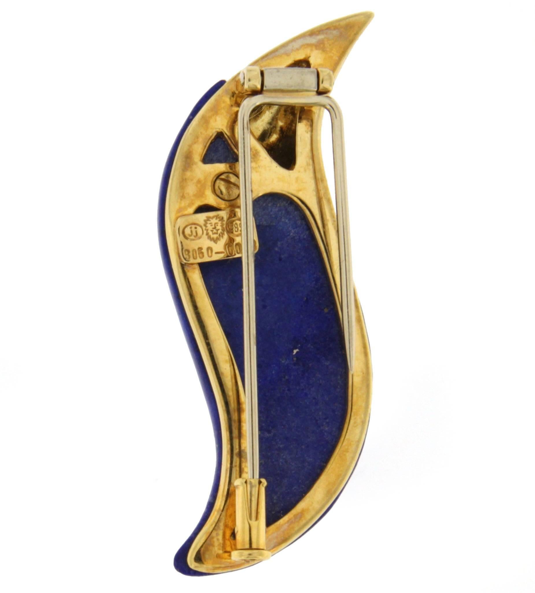 Jona design collection, hand crafted in Italy, 18 karat yellow gold and lapis lazuli toucan brooch, set with a white diamond eye.    
All Jona jewelry is new and has never been previously owned or worn. Each item will arrive at your door beautifully