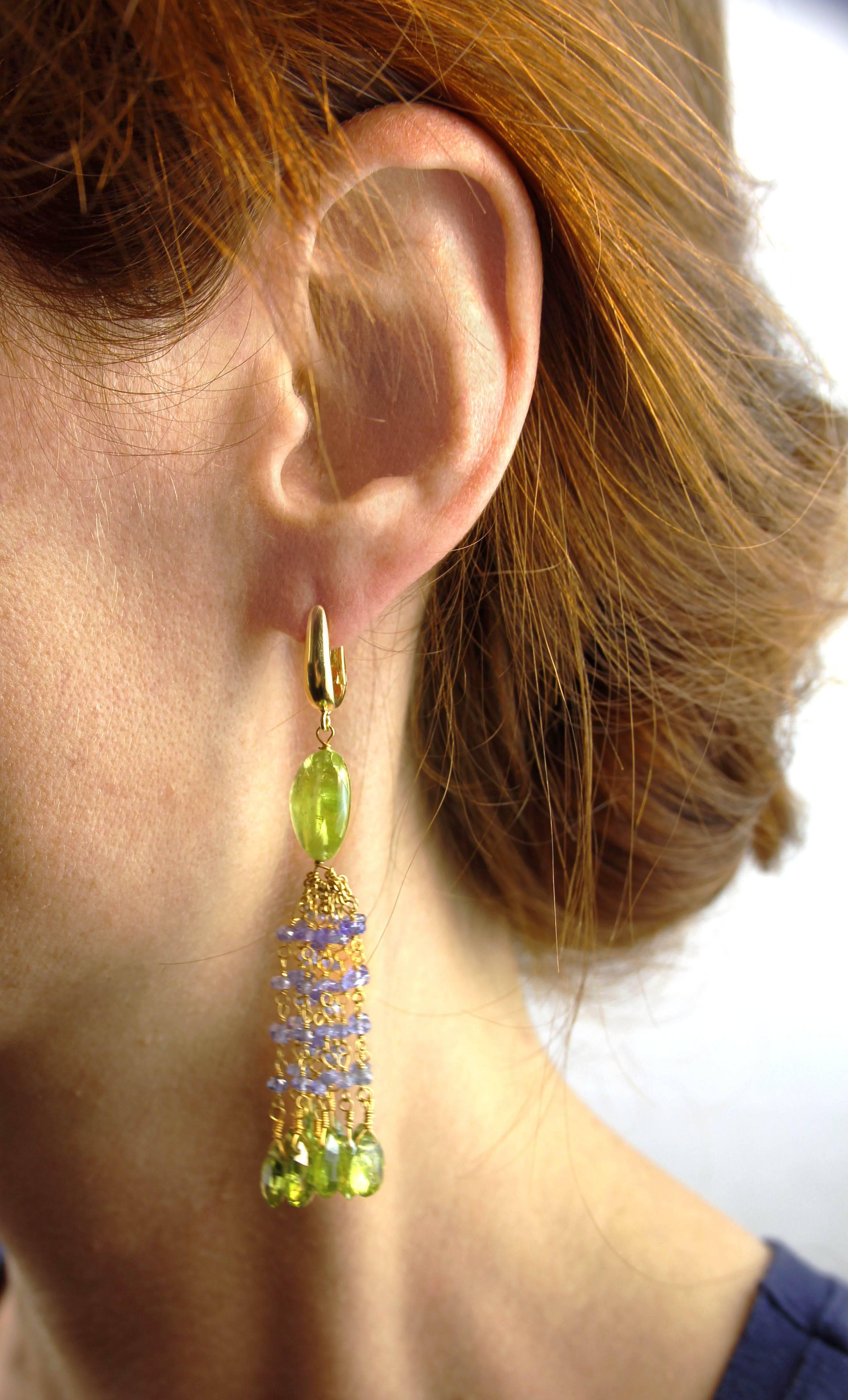 Jona design collection, 18 karat yellow gold earrings, composed of iolite and peridot tassels.

All Jona jewelry is new and has never been previously owned or worn.