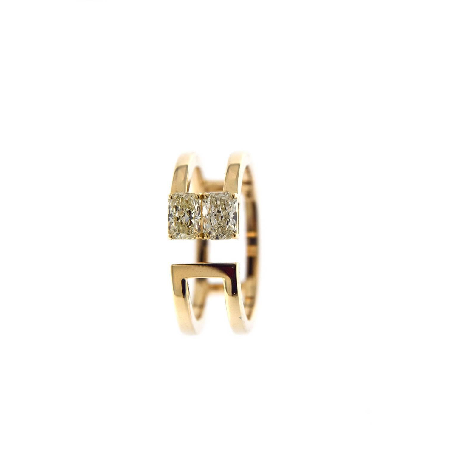 Jona design collection, hand crafted in Italy, 18 Karat yellow gold open band ring set with 2 radiant cut yellow diamonds weighing 0.83 carats in total, VS1 Clarity. US size 6.5 can be sized to any specification. All Jona jewelry is new and has