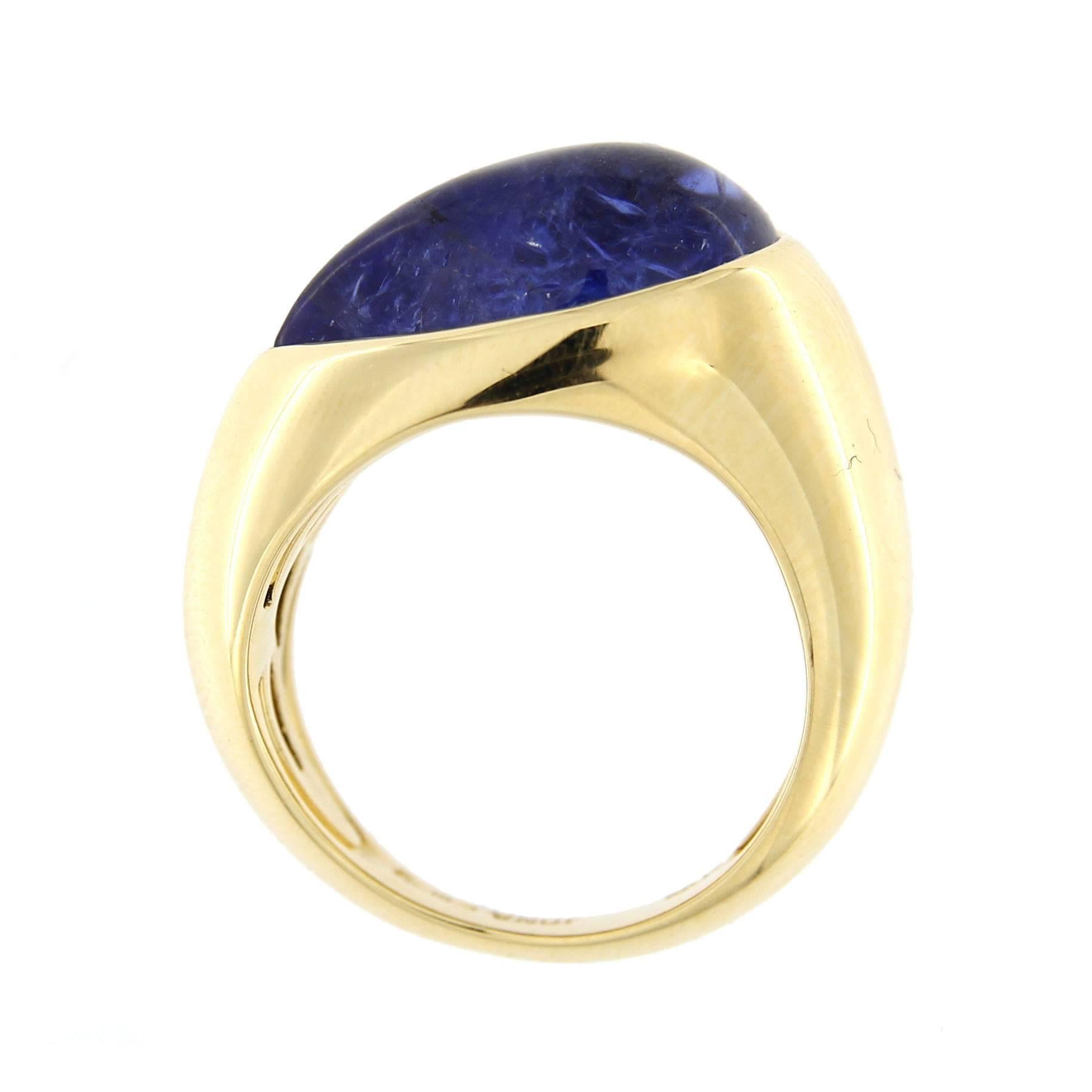 Jona design collection, hand crafted in Italy, 18 Karat yellow gold ring centering a 8.4 carat cabochon drop Tanzanite. Ring Size US 6.

All Jona jewelry is new and has never been previously owned or worn. Each item will arrive at your door
