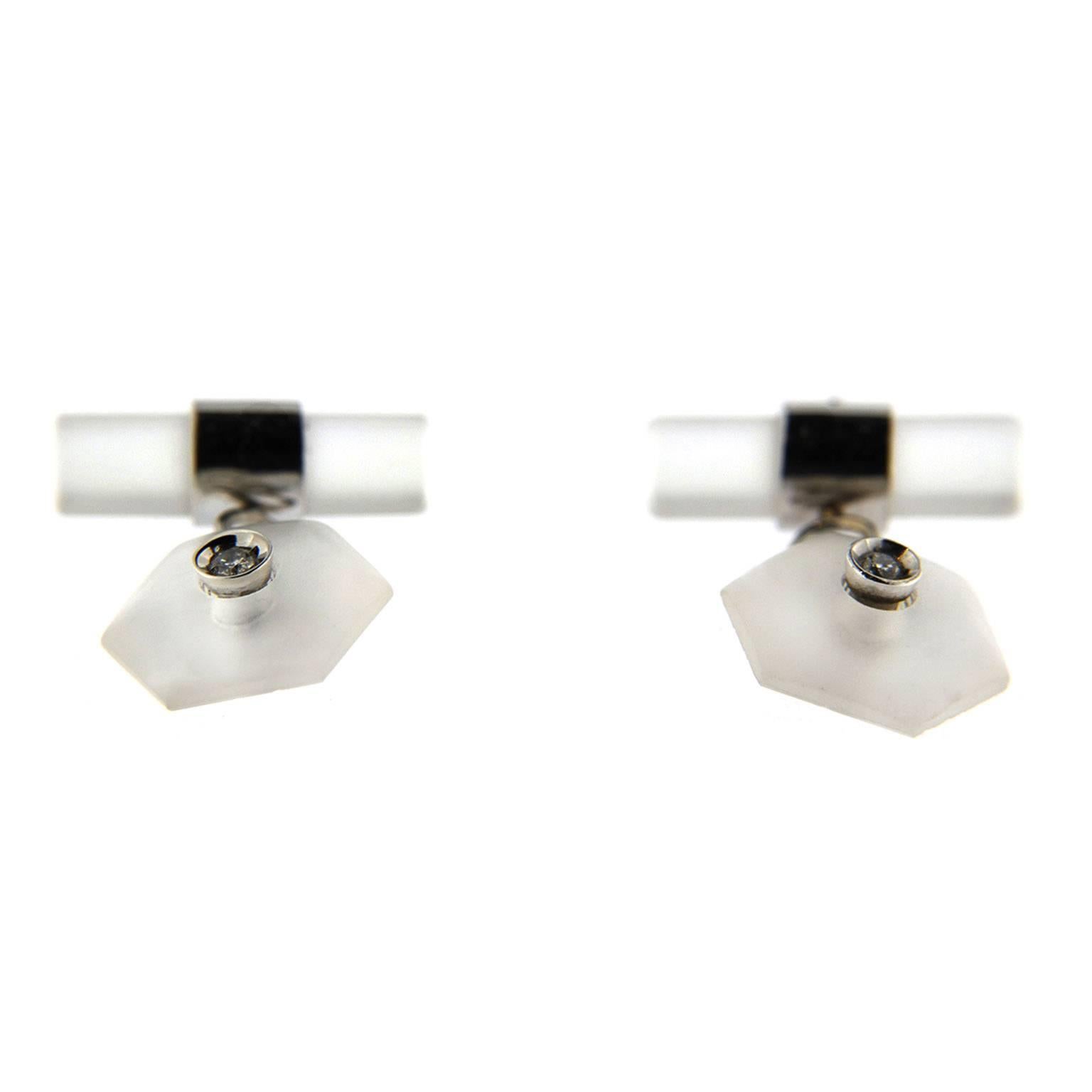 Jona design collection, hand crafted in Italy, 18 Karat white gold rock crystal cufflinks. The hexagons are set with two white diamonds weighing 0.8 ct. Dimensions: 0.47 in. H x 0.54 in. W x 0.15 in. D - 11 mm. H x 13 mm. w x 3 mm. D
All Jona