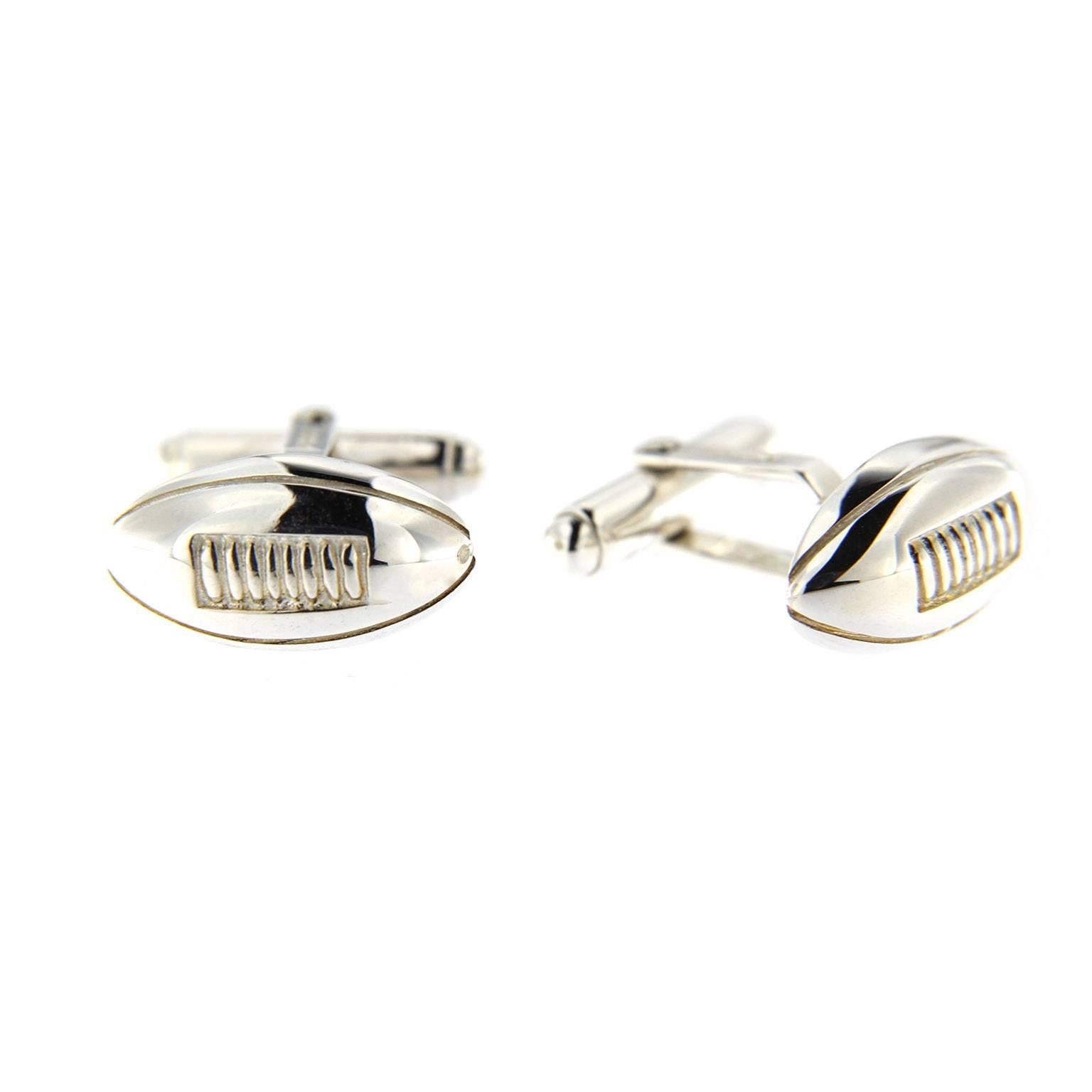 Jona design collection, hand crafted in Italy, rhodium plated sterling silver football cufflinks. Marked JONA 925.

All Jona jewelry is new and has never been previously owned or worn. Each item will arrive at your door beautifully gift wrapped in