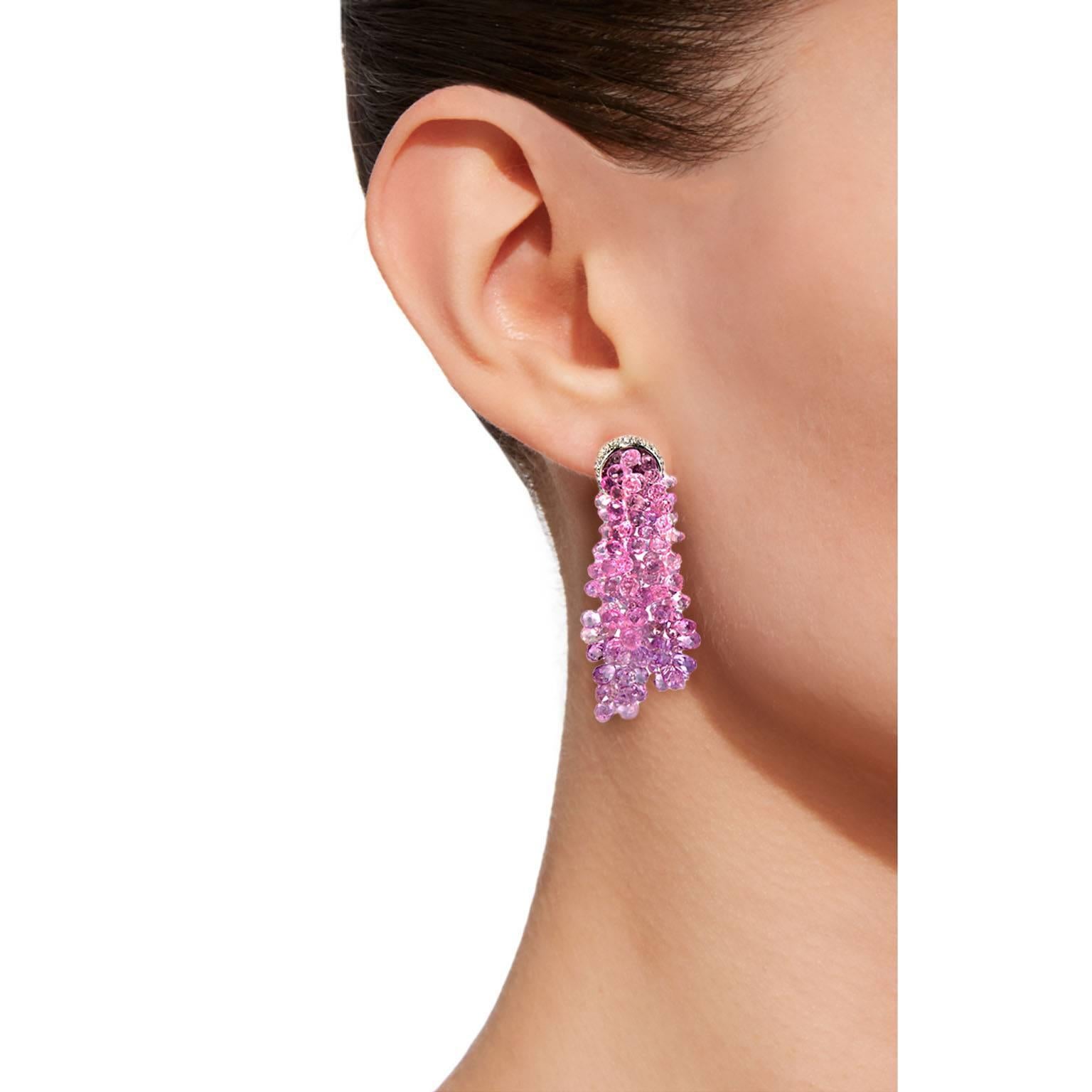 Jona one-of-a-kind design, hand crafted in Italy, pair of pendant earrings presenting clusters of briolette cut graduated pink sapphires for a total weight of 61.85 carats, sustained by a fine 18 karat white gold mounting set with 1.52 carats of