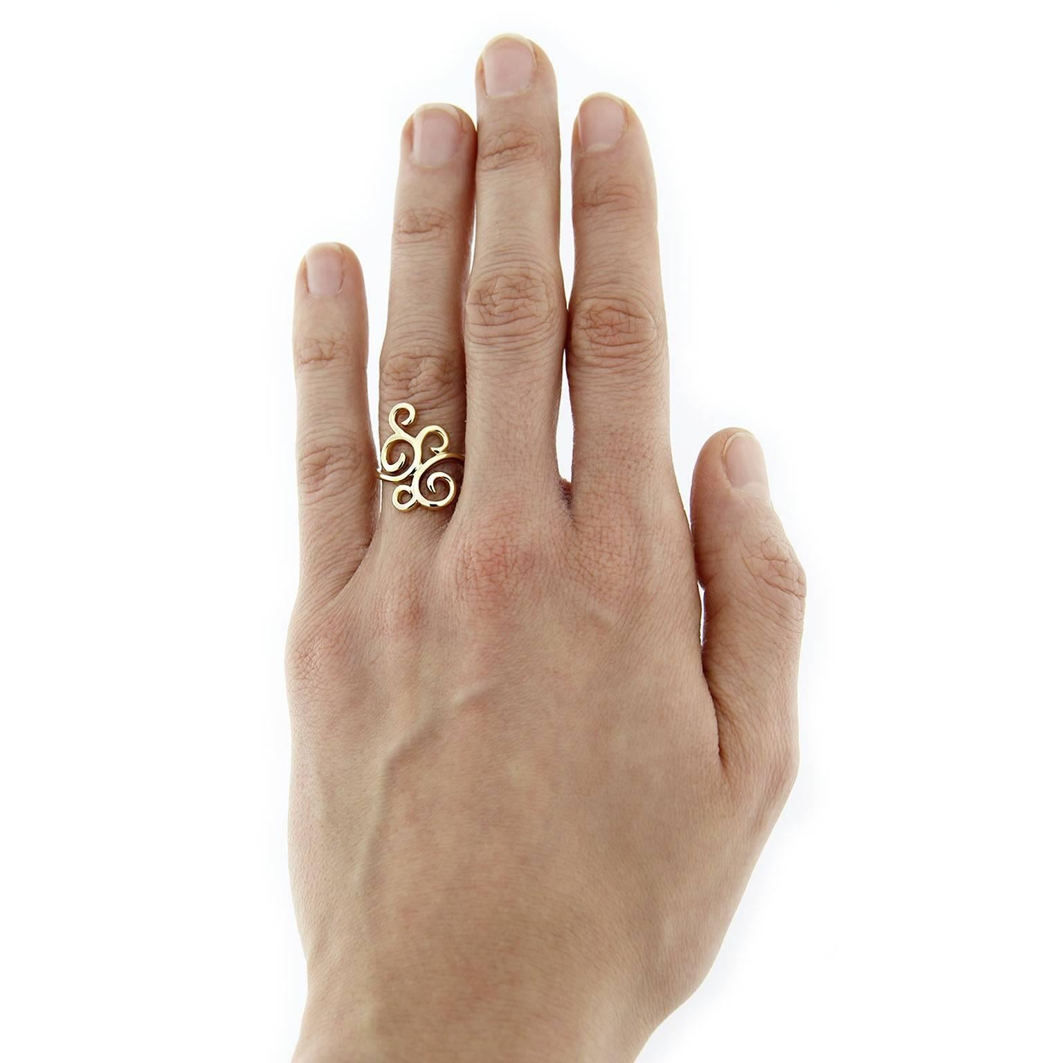 Ghirigori 18 karat yellow gold swirl ring designed by Jona and hand crafted in Italy. Ring size 6 US.
All Jona jewelry is new and has never been previously owned or worn. Each item will arrive at your door beautifully gift wrapped in Jona boxes, put