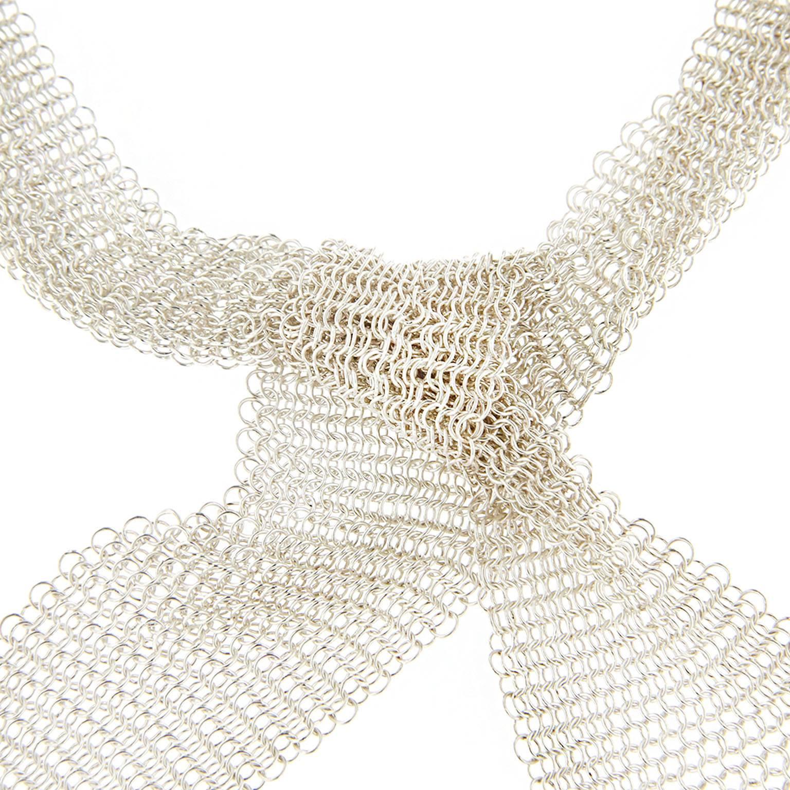 Jona Collection, hand crafted in Italy, Sterling Silver continuous mesh Tie Scarf / Necklace. This necklace is 30mm-1.18 inch wide and 114cm-45 inches long, with a total weight of 134 grams.

All Jona jewelry is new and has never been previously