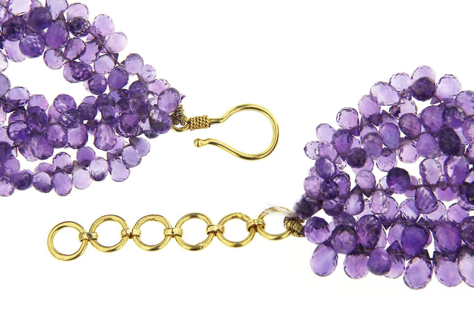 Jona collection, Five Strand Faceted Briolette Amethyst Necklace with a   18kt Yellow Gold Clasp.
Dimensions: 1.96 in. W x 18.89 in. L. - 5 cm. W x 48 cm. L
All Jona jewelry is new and has never been previously owned or worn. Each item will arrive
