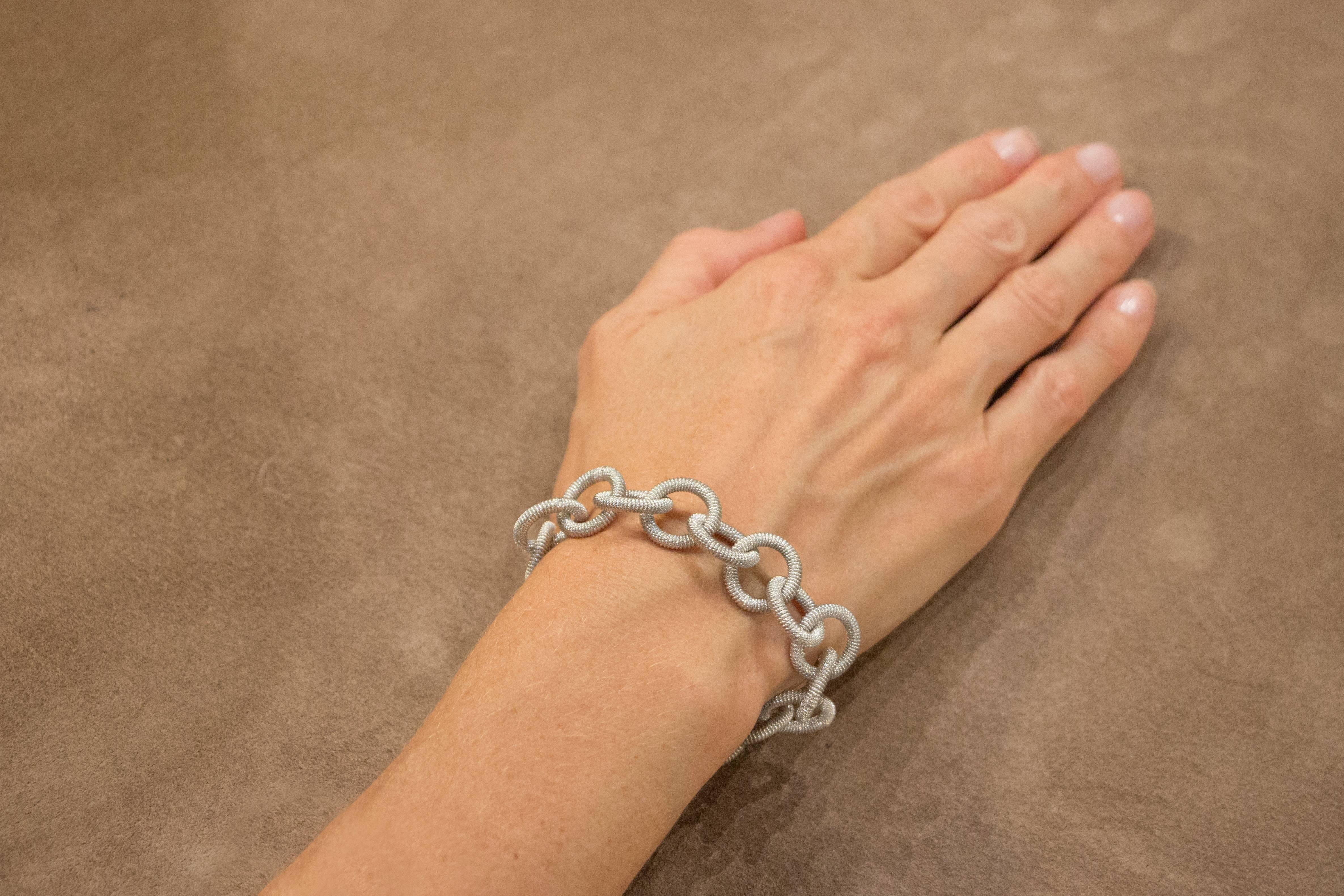 Alex Jona design collection, hand crafted in Italy, rhodium plated twisted wire sterling silver link chain bracelet. Marked Jona.
Dimensions
7.06 in. L. x 0.65 in. W x 0.63 in. D
18 cm. L. x 1.65 cm. W x 1.6 cm. D
Alex Jona jewels stand out, not