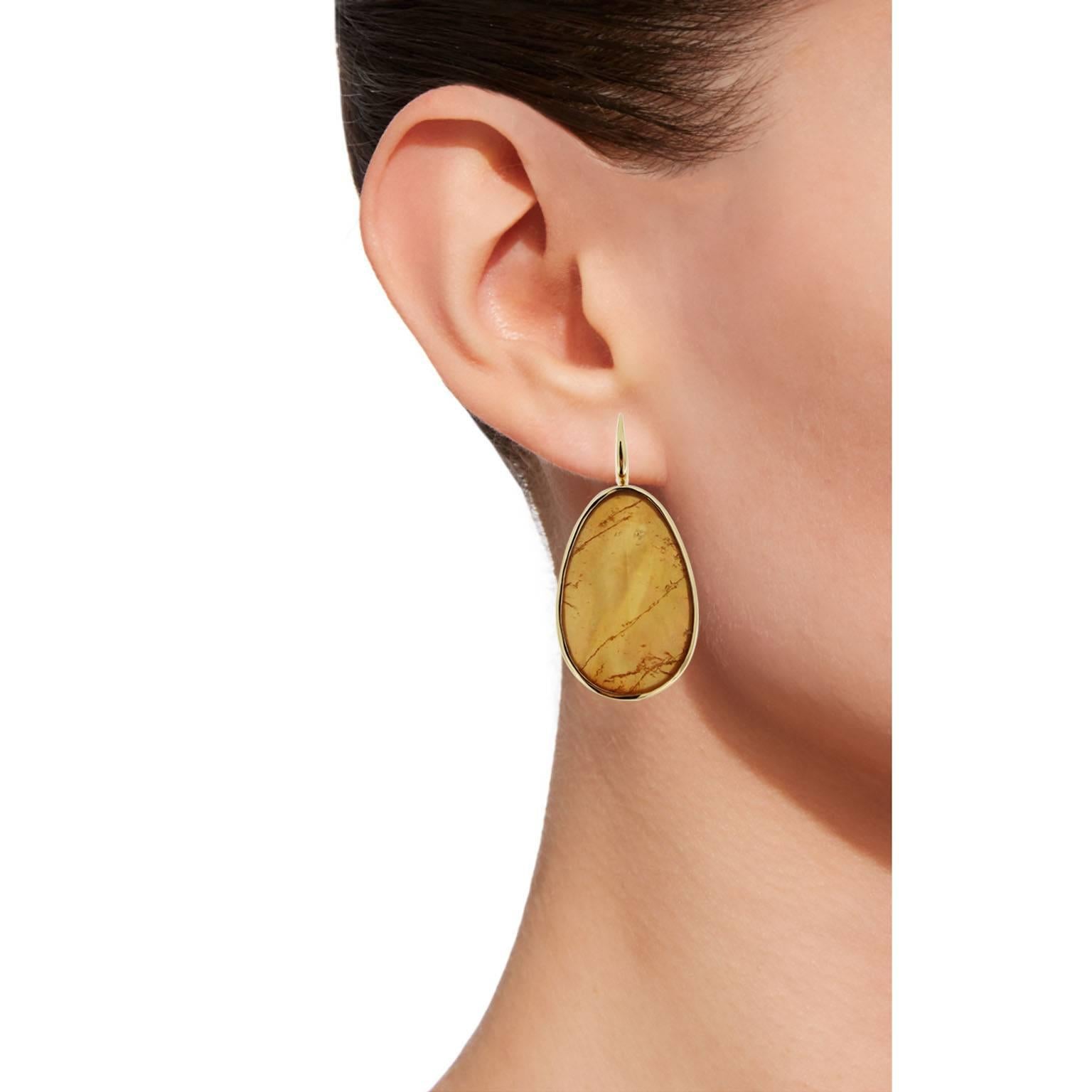 Jona design collection, hand crafted in Italy, 18 karat yellow gold pendant earrings set with two crazy cut quartz over yellow jade and mother of pearl drops.

Dimensions:
1.87 in. H x 0.88 in. W x 0.19 in. D
47 mm. H x 22 mm. W x 5 mm. D

All Jona