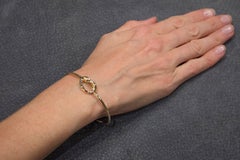 Jona 18 Karat Yellow Gold Knot Bangle Bracelet