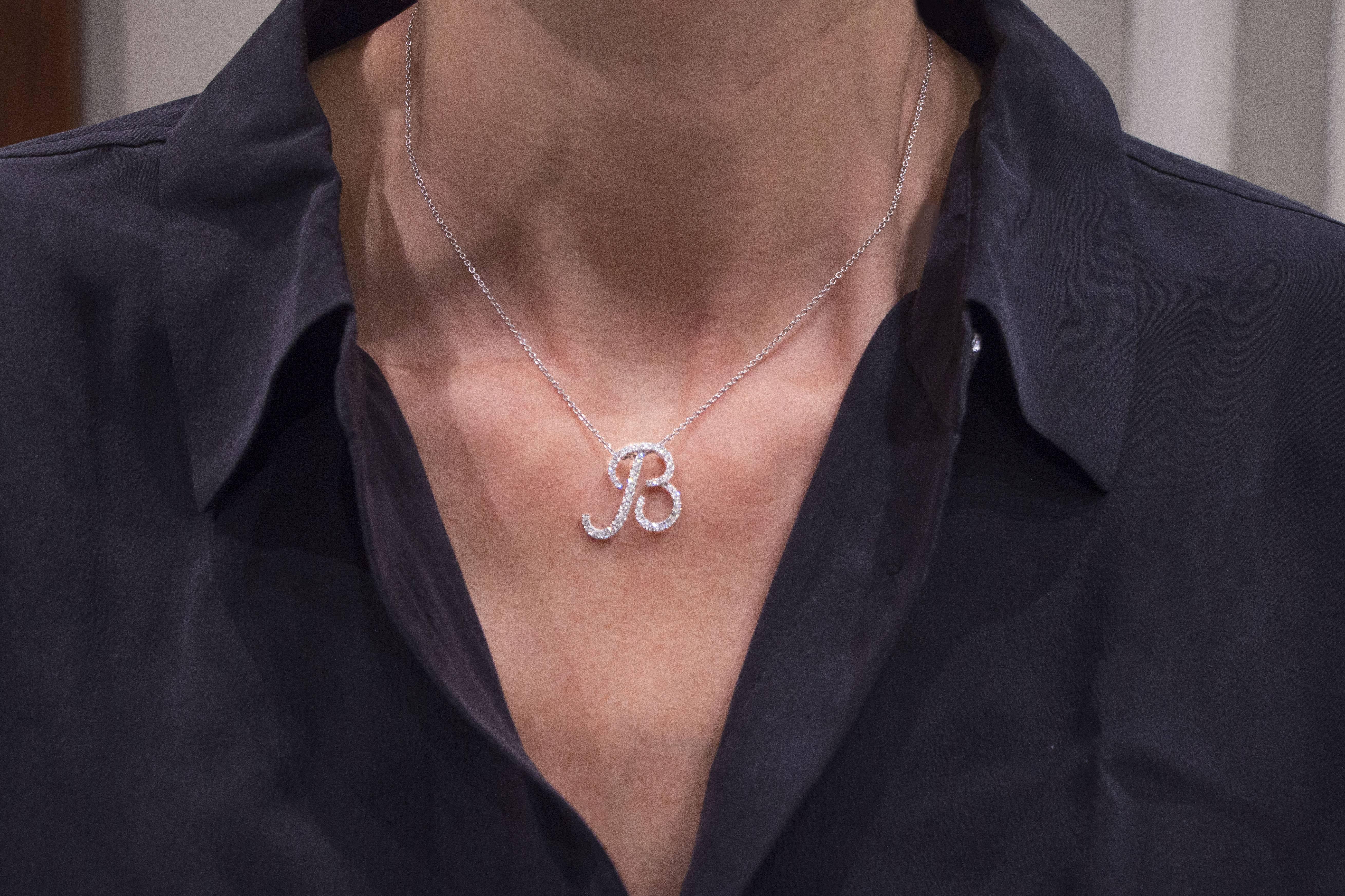 Jona design collection, hand crafted in Italy,  18 karat white gold initial letter B pendant, set with 0.74 carats of white diamonds, F color, VVS1 clarity, suspending from a 18 karat white gold chain 17.7