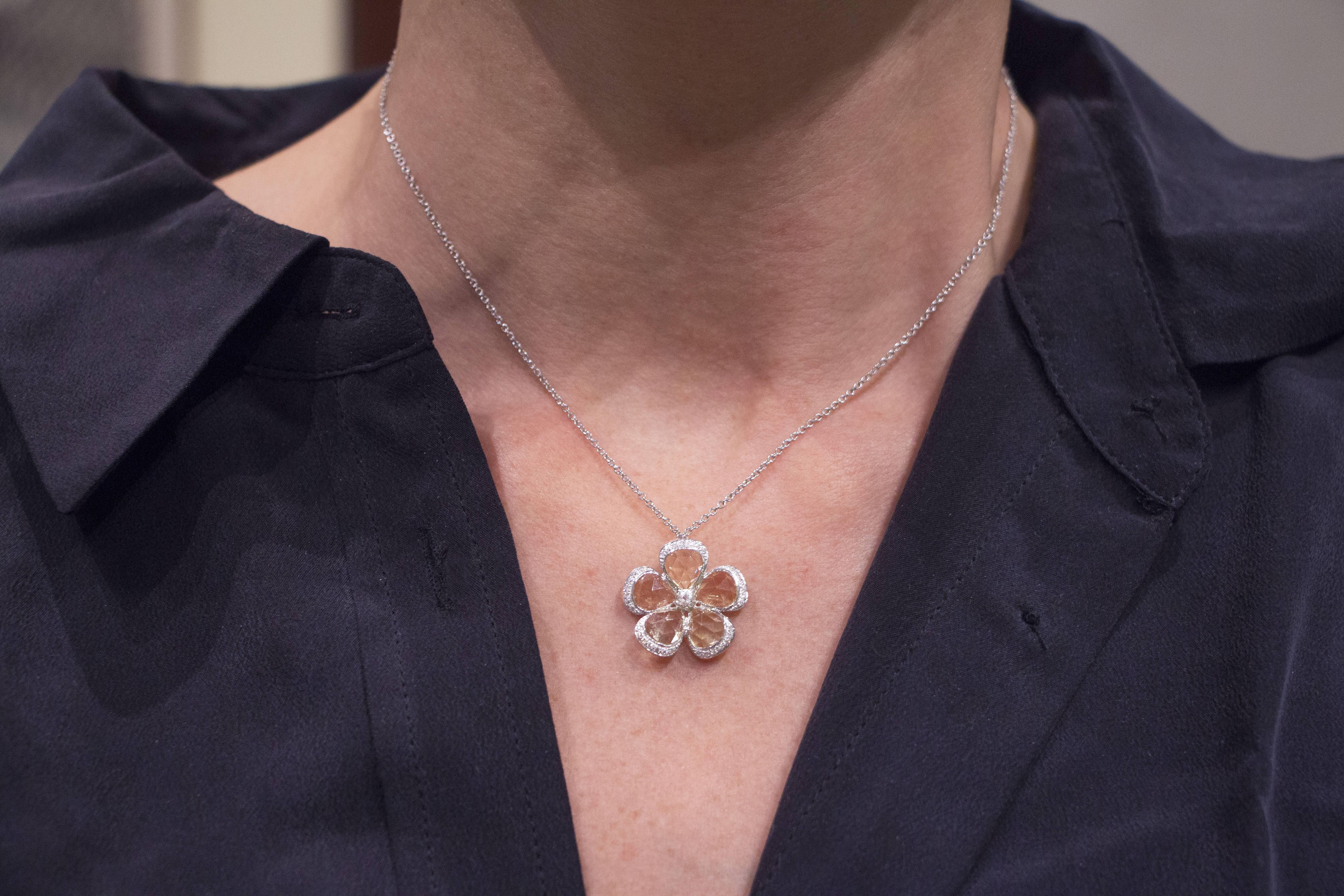 Jona design collection, hand crafted in Italy, 18 karat white gold flower pendant, set with 3.95 carats of faceted citrine petals, surrounded by 0.13 carats of white diamonds, suspending from a 18 karat white gold chain necklace, 18 inch - 45cm