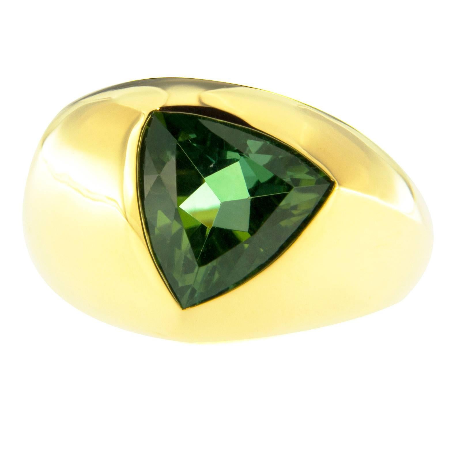 Alex Jona design collection, hand crafted in Italy, 18 karat yellow gold ring set with a trillion cut intense green tourmaline weighing 6.13 carats. US size 6 / EU size 12, can be sized to any specification. Ring Dimensions: H 0.96 in x W 0.84 in x