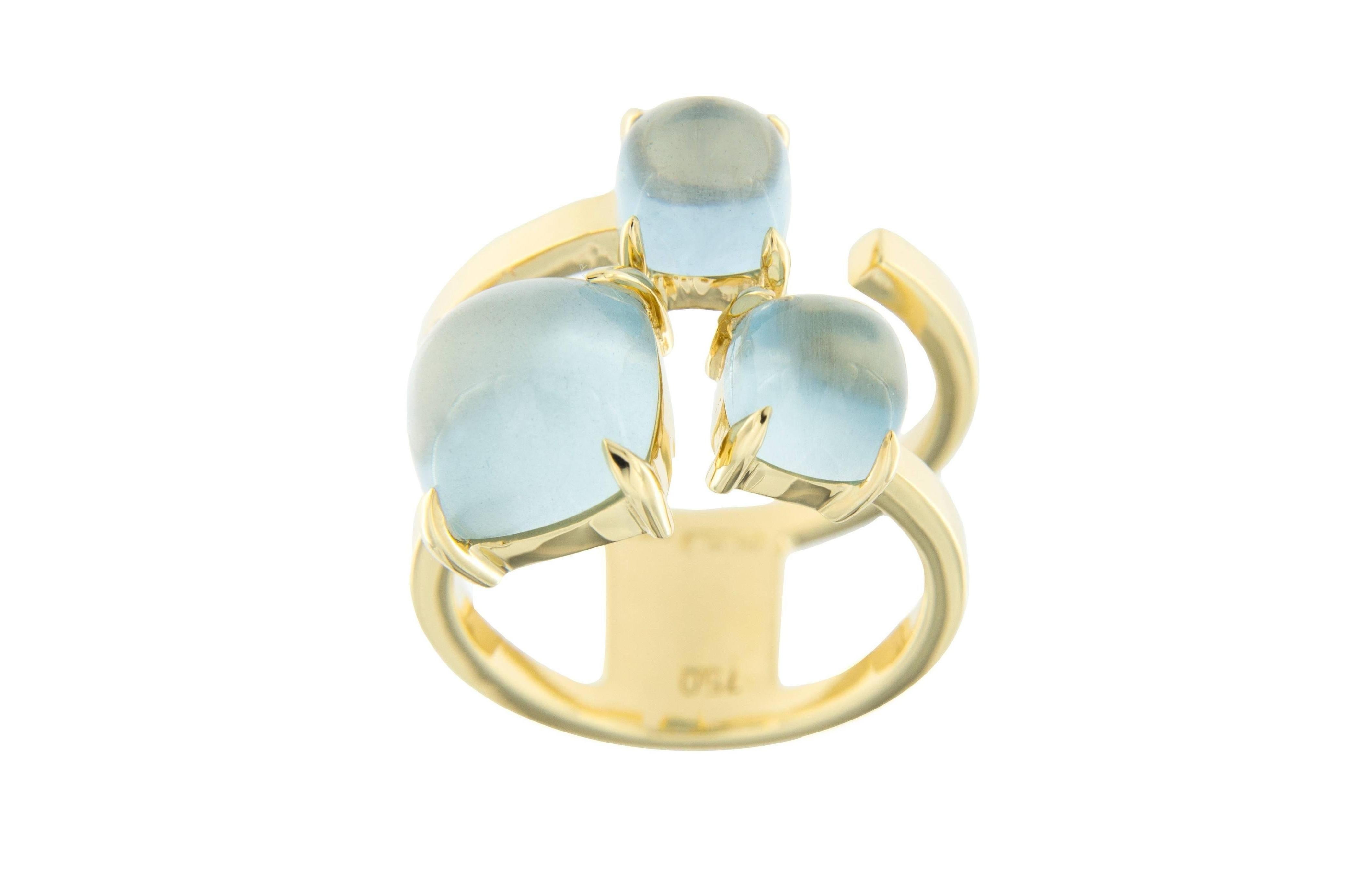 Jona design collection, hand crafted in Italy, 18 karat yellow gold double open ring band, set with three aquamarine weighing 6.65 carats in total.
US size 6/ EU 12, can be sized to any specification. Ring Dimensions:
H 1.02 in / W 19.84 in / 0.39