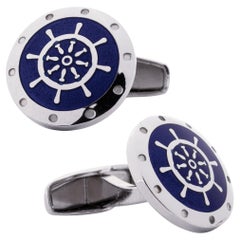 Gemelli a forma di ruota di barca con smalto blu di Alex Jona in argento sterling