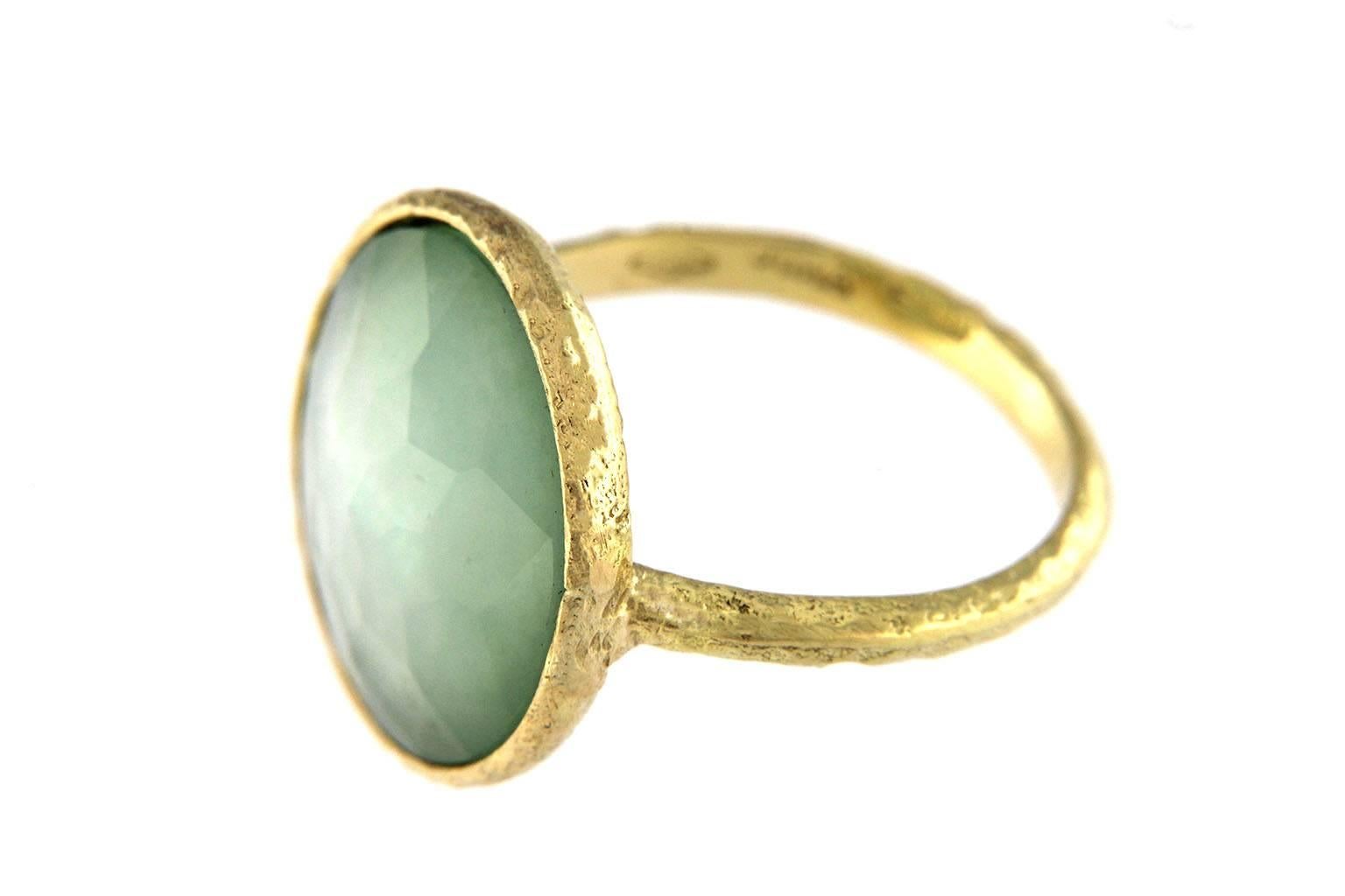 Jona design collection, hand crafted in Italy, 18 Karat yellow gold ring set with a crazy cut quartz over Chrysoprase and mother of pearl, weighing 7.18 carats. 
Size US 6.5, can be sized to any specification
All Jona jewelry is new and has never