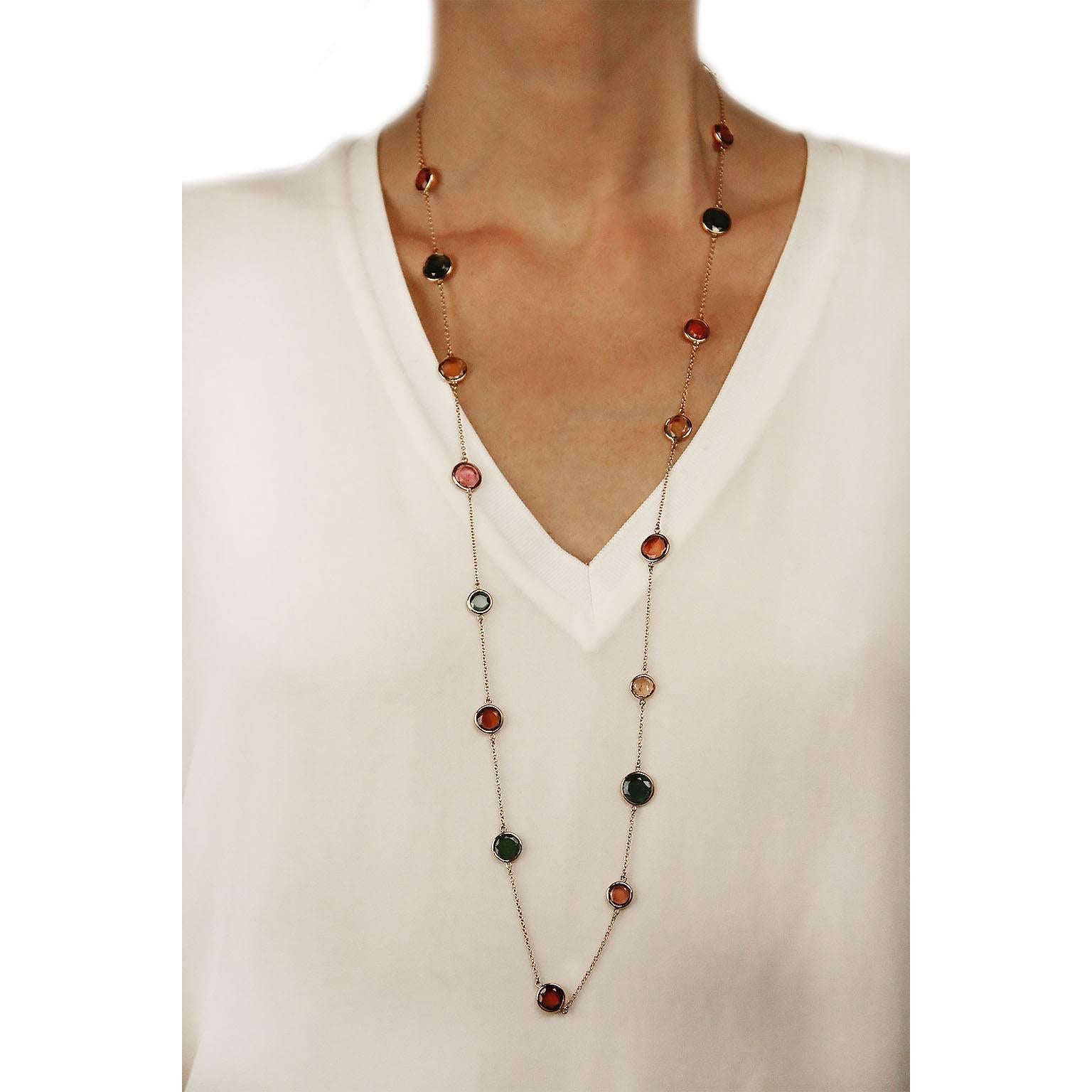 Jona design collection, hand crafted in Italy, 18 karat yellow gold 35 inch-90 cm. long sautoir necklace, accented by 19 multicolor flat cut tourmalines with bezel-set, around the entire design. 
All Jona jewelry is new and has never been previously