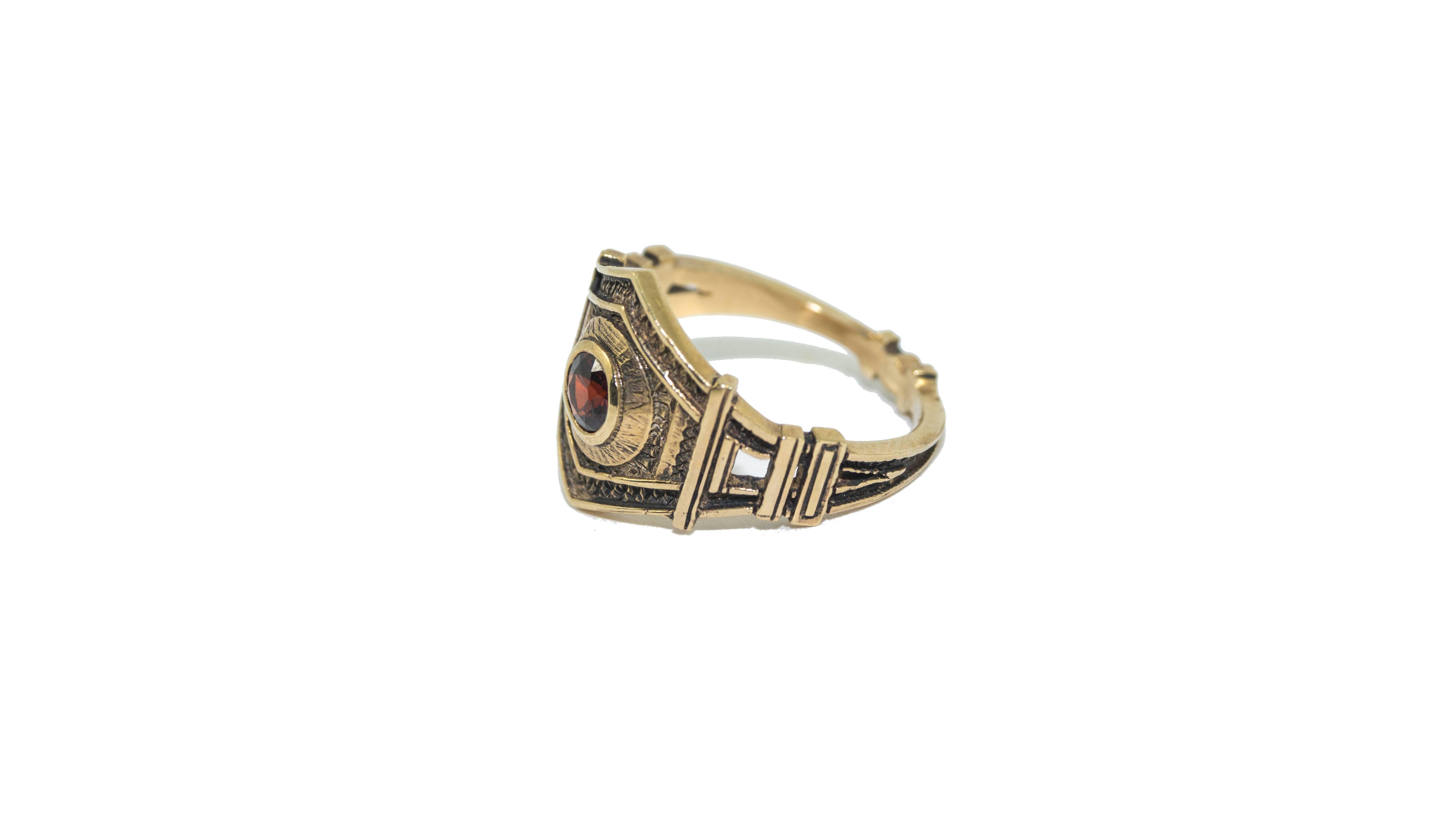 *MADE TO ORDER - 5 WEEK LEAD TIME*

9ct Yellow gold Zara Simon Paris ring with 4mm Garnet and hand engraved details.