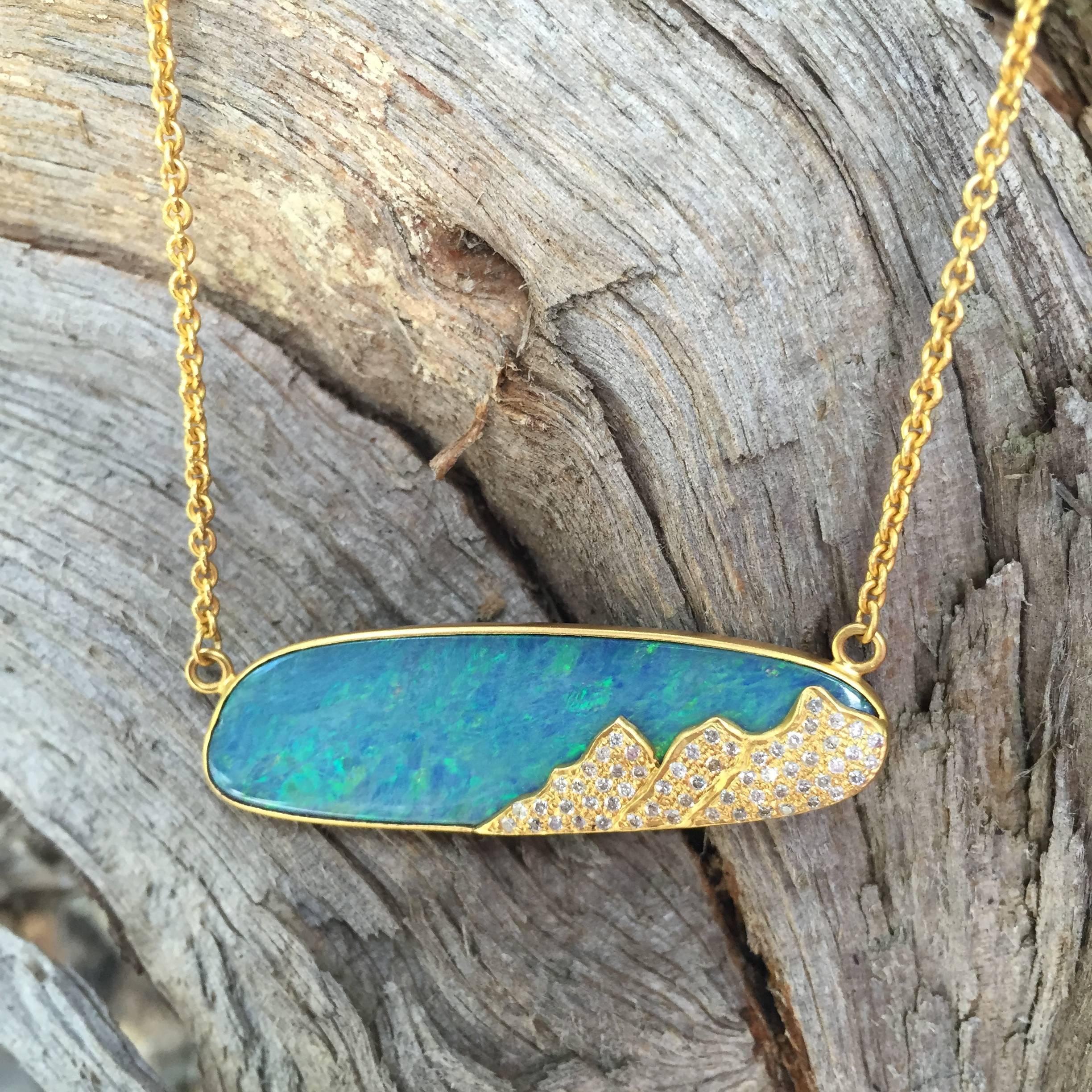 One-of-a-kind Boulder Opal with .33 Carats of Diamond Mountains, set in Lauren's signature sand blasted 18kt Gold matte finish.  This Opal has blue and green flash in it, and the mountain scene is perfect for any nature lover.  Chain is adjustable