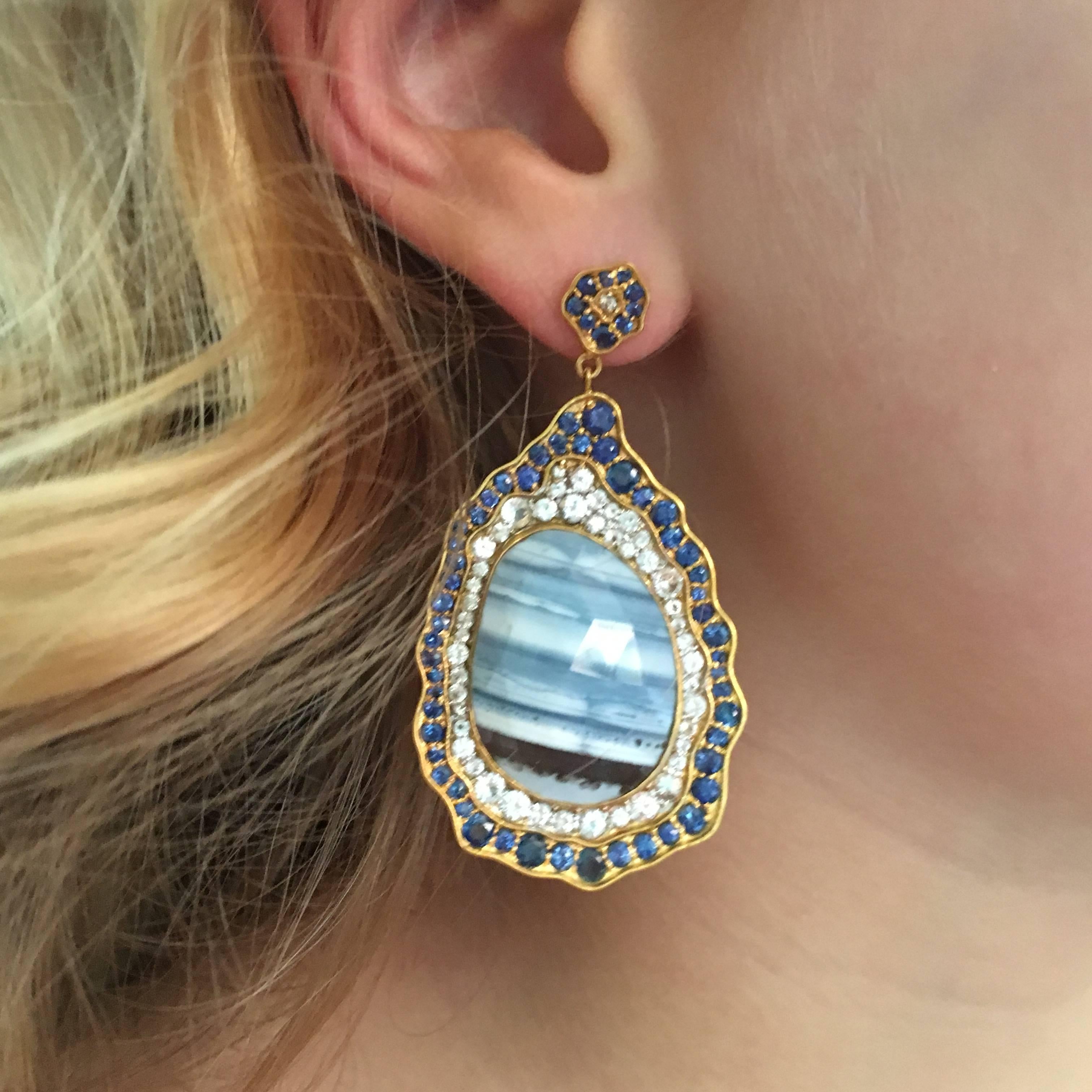 Exotic and red carpet ready!  One of a kind striped Blue, Grey and White African Opals set in organic designed bands of blue and white Sapphires in 18k matte gold on posts.  These earrings will get you noticed all evening long!  Posts come with