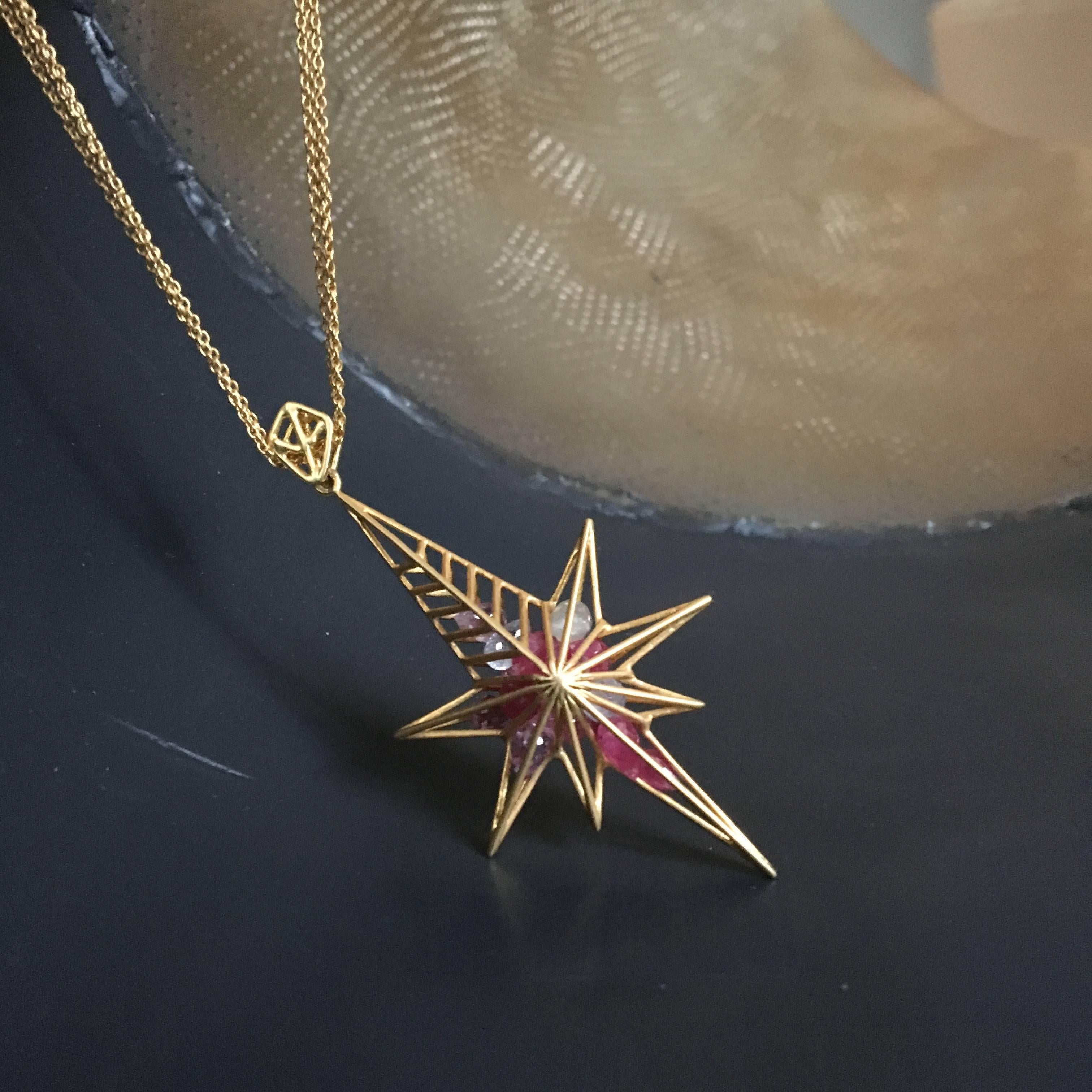 Loose pink and white sapphires are held inside this beautiful 18kt yellow Gold Star pendant cage, making a feminine and unique statement.  Finished in Lauren Harper's signature matte gold, this pendant is great for day or night wear, and will be