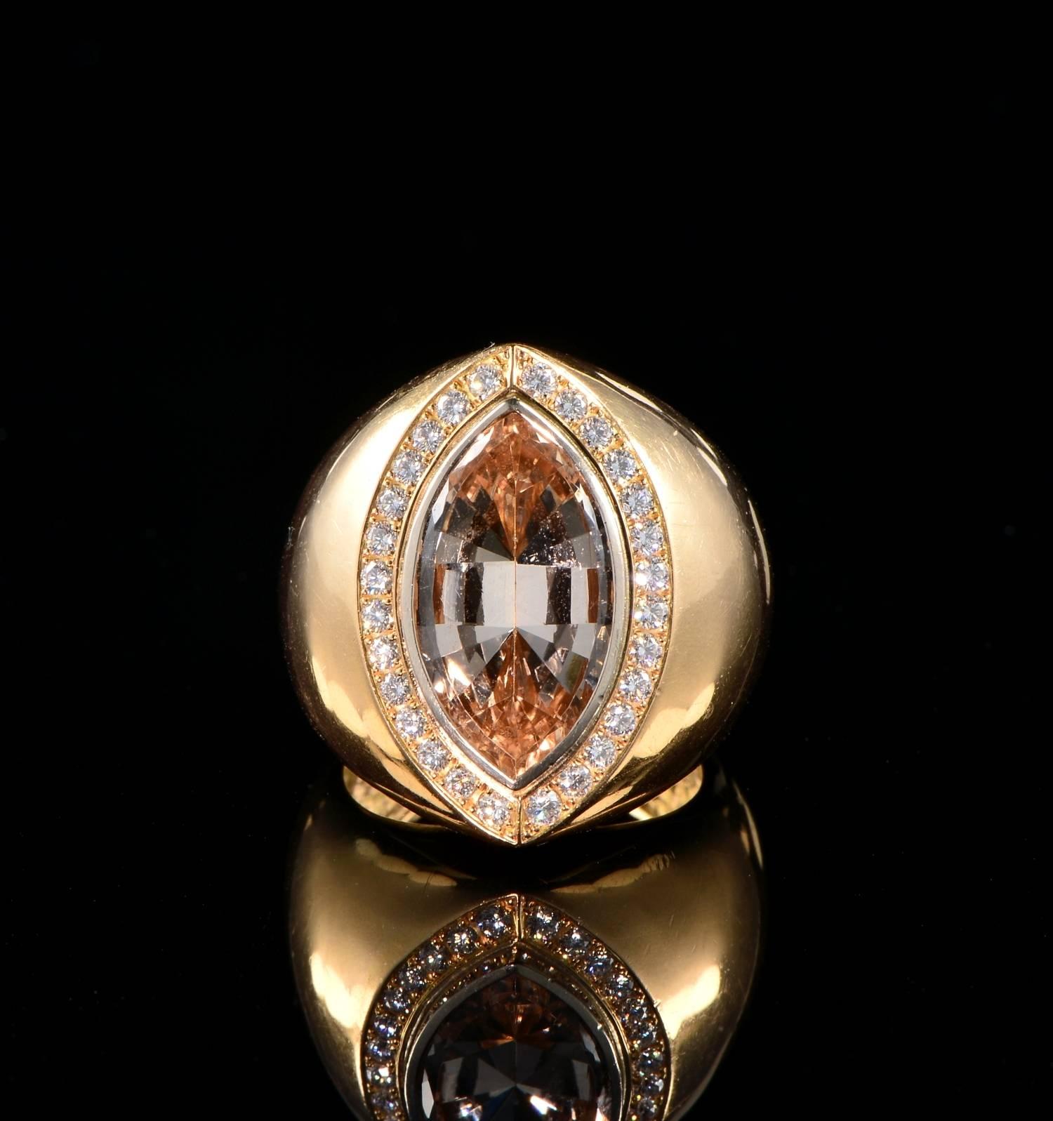 Exclusive design all superbly hand crafted of solid 18 kt ROSE gold very substantially made it weighs 19.6 grams

Design has been inspired by the shape of the Natural Imperial Topaz set on it simple and very eye catching

The ring is marked for 18