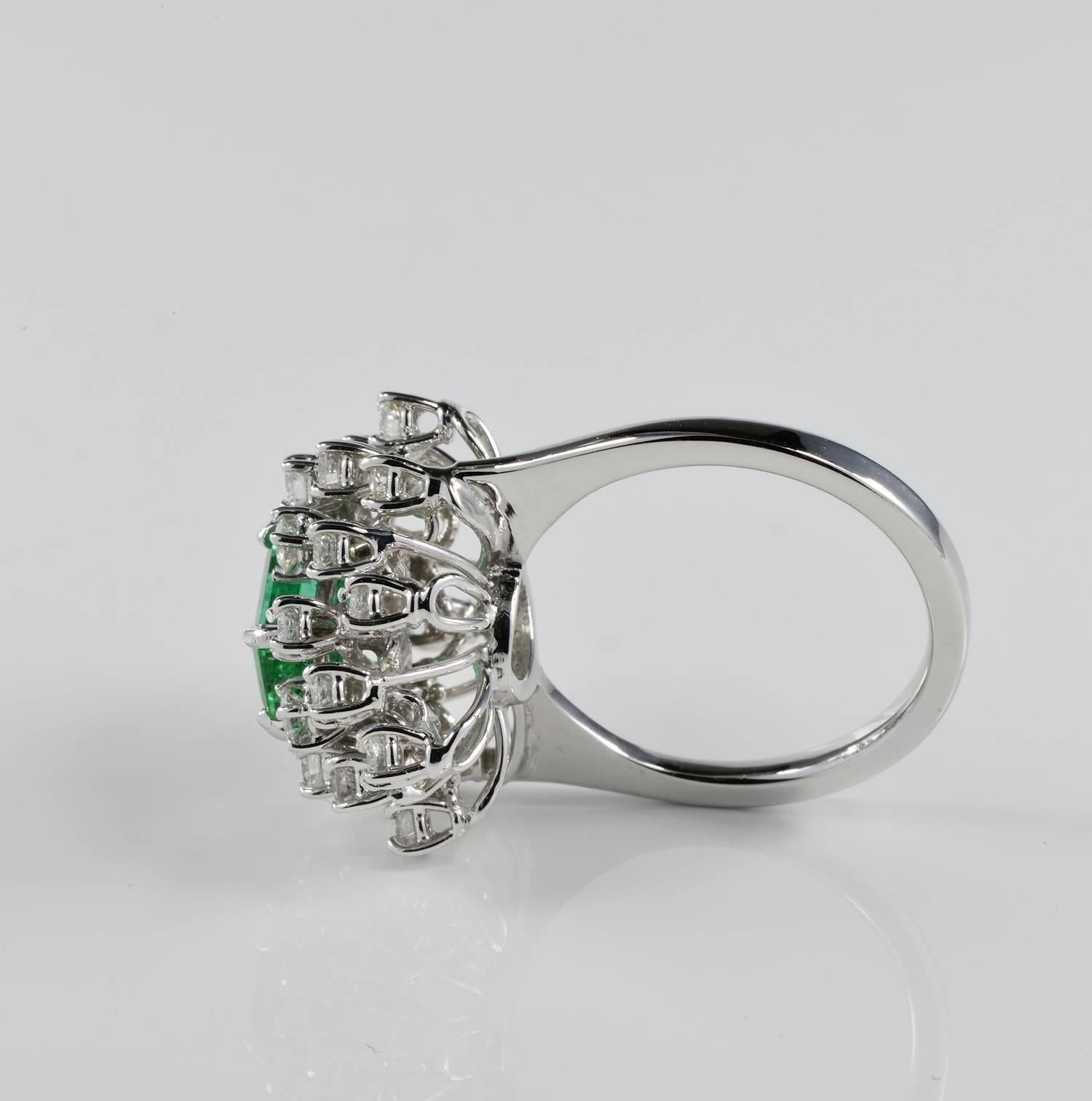 Contemporary 1.70 Carat Natural Colombian Emerald 1.50 Carat Diamond Vintage Cluster Ring For Sale