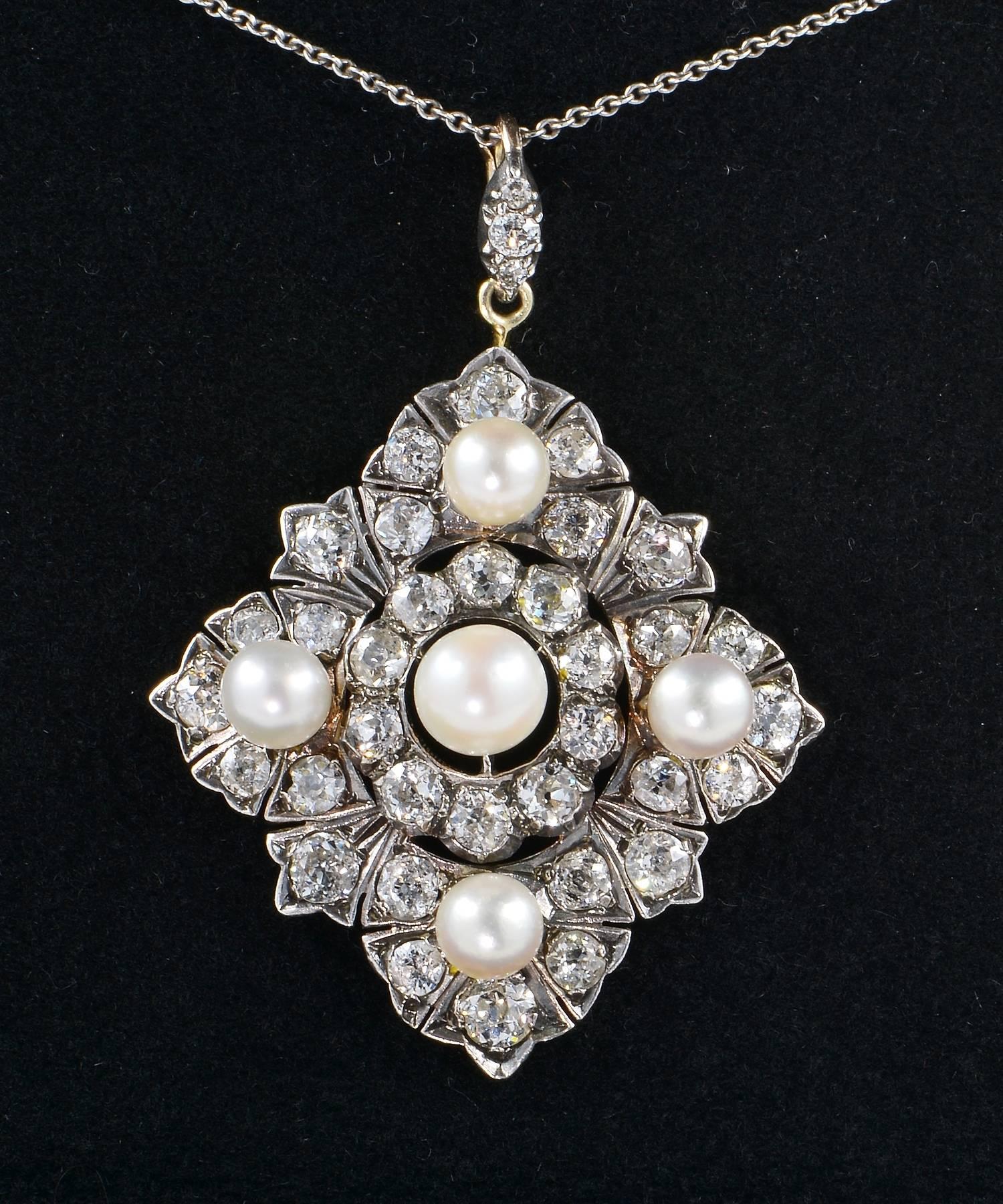 Beautiful behind beliefs, authentic Victorian pendant crafted of solid 18 KT gold and silver - not marked.
Richly set with old mine cut Diamonds for an amazing Diamond sparkle.
Complemented by five, up in quality, Natural not nucleated pearls from