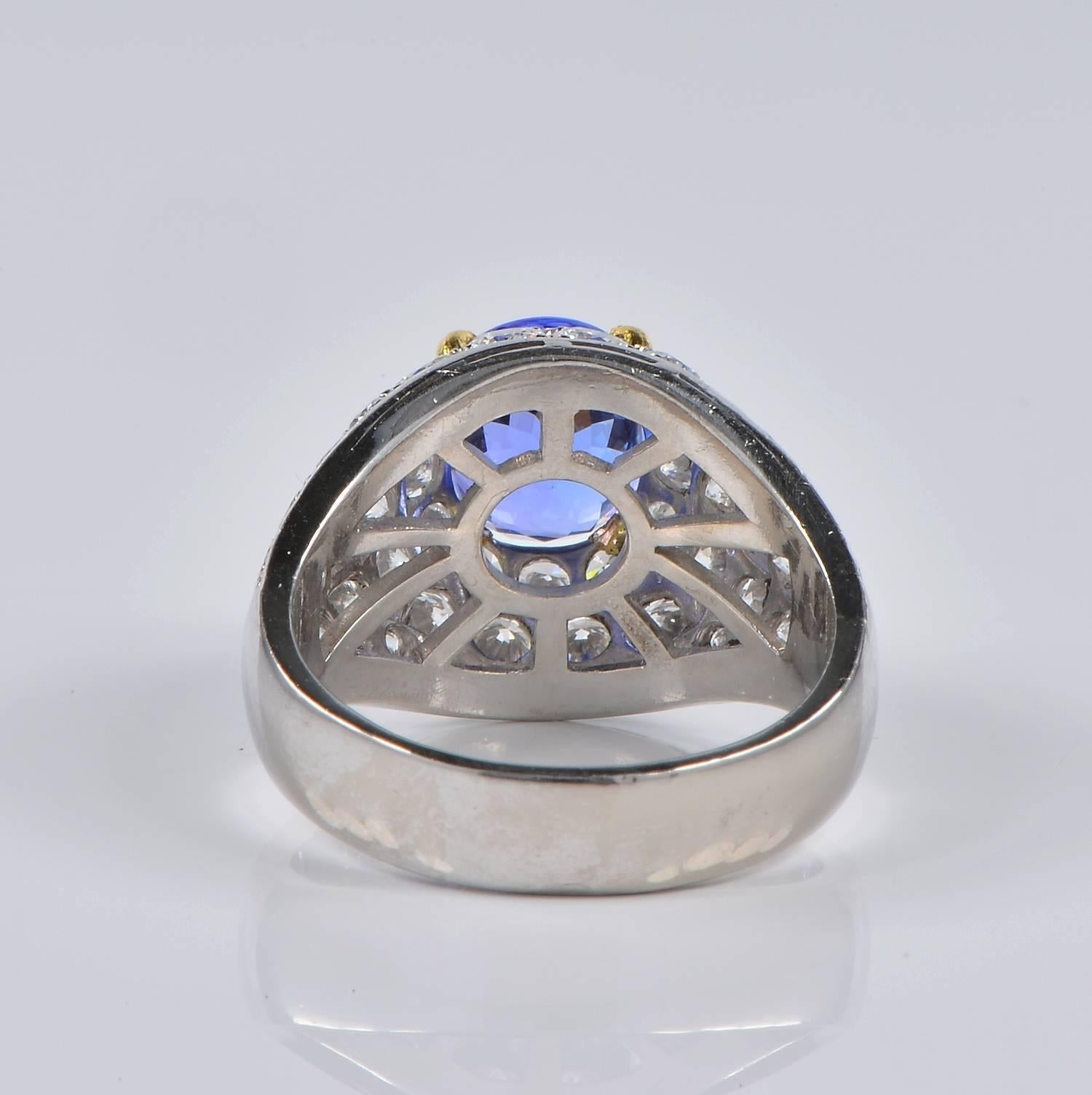 Women's 2.40 Carat Tanzanite 3.80 Carat Diamond Vintage Platinum Ring For Sale