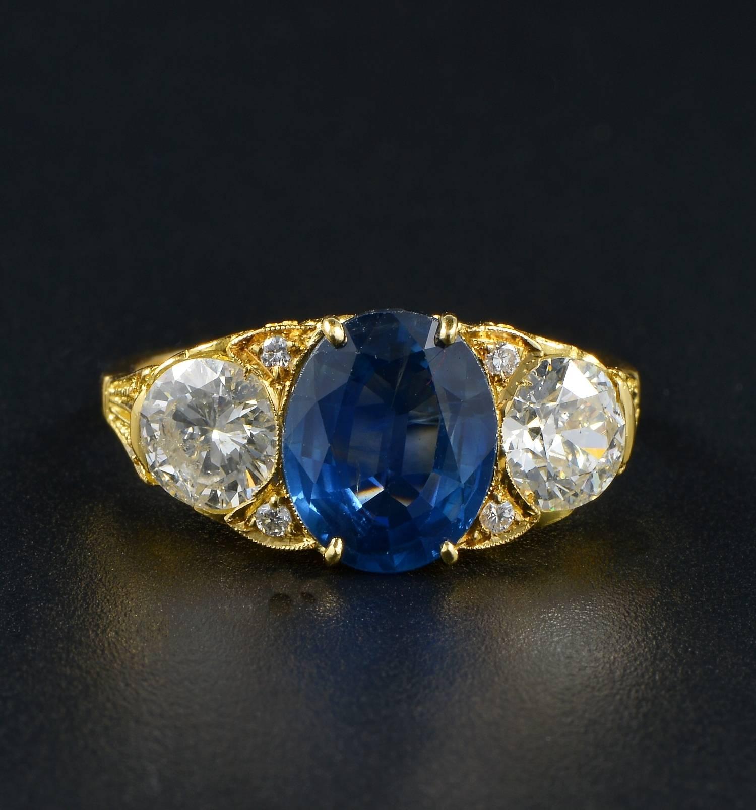 Authentic Victorian trilogy ring in charming trilogy composition.

Classy scroll design of the period (1890 ca) holding a composition of three stone nestled into the crown.

Boasting a centre 100% natural no Heat Sapphire of beautiful blue, good