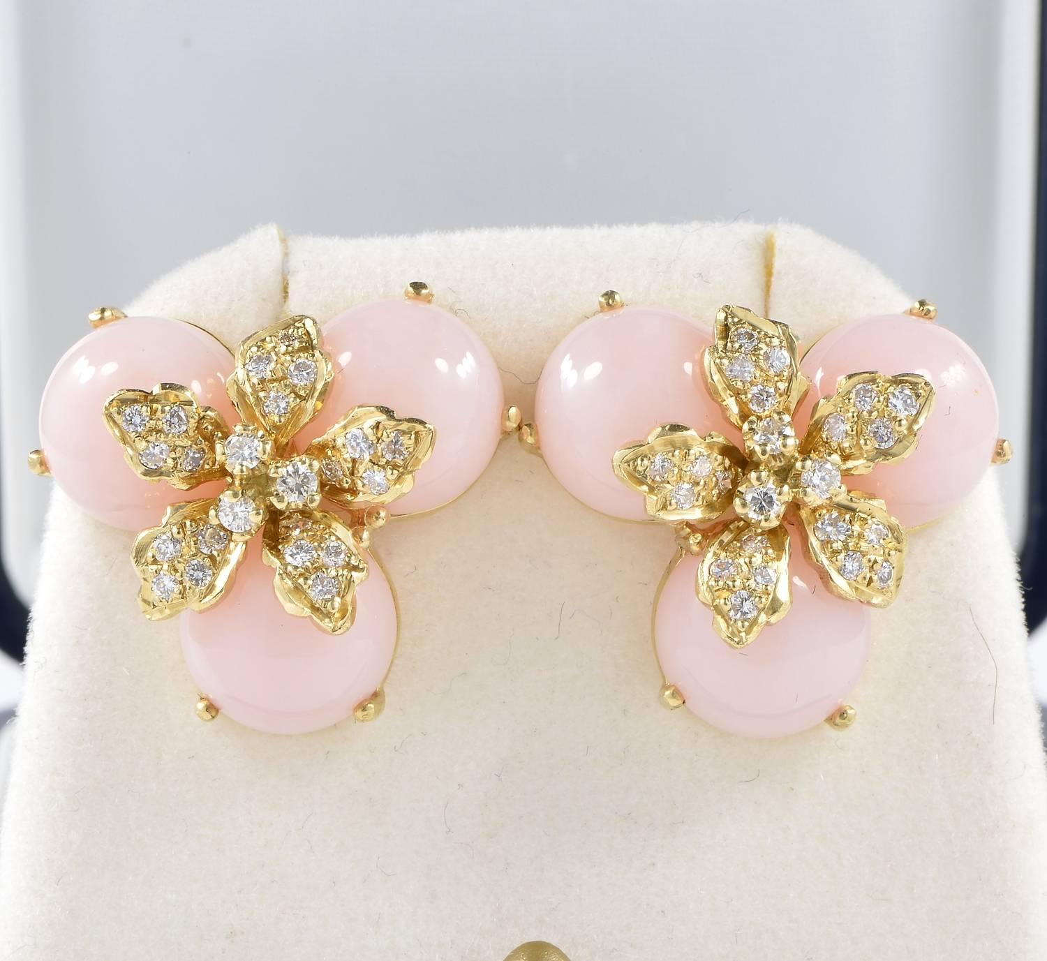 Sophisticate, finely designed and crafted, exclusive pair of vintage earrings set with natural Pink Opal and Diamonds.
Gorgeous flowers in between the composition of Pink Opals. 
Fully highlighted by Diamonds, approx 1.0 Ct rated G VVS/VS
Italian