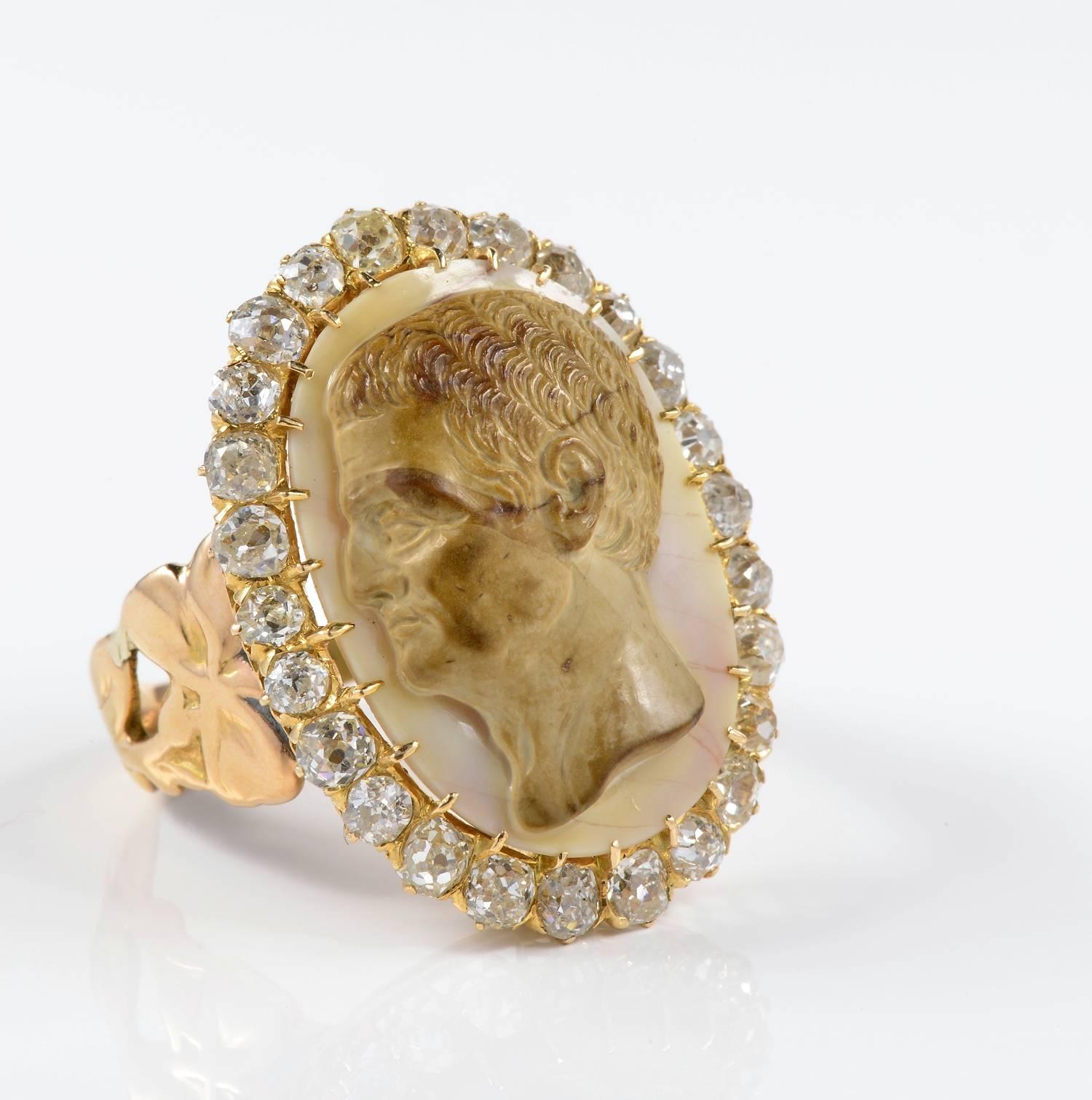 Rare authentic Victorian ring depicting Augustus portrait head, skilfully carved on agate with an impressive old mine cut Diamonds content, 2.50 Ct rated G/H VVS/VS
Hand crafted mounting made of 18 KT rose gold - not marked. Italian origin 1860