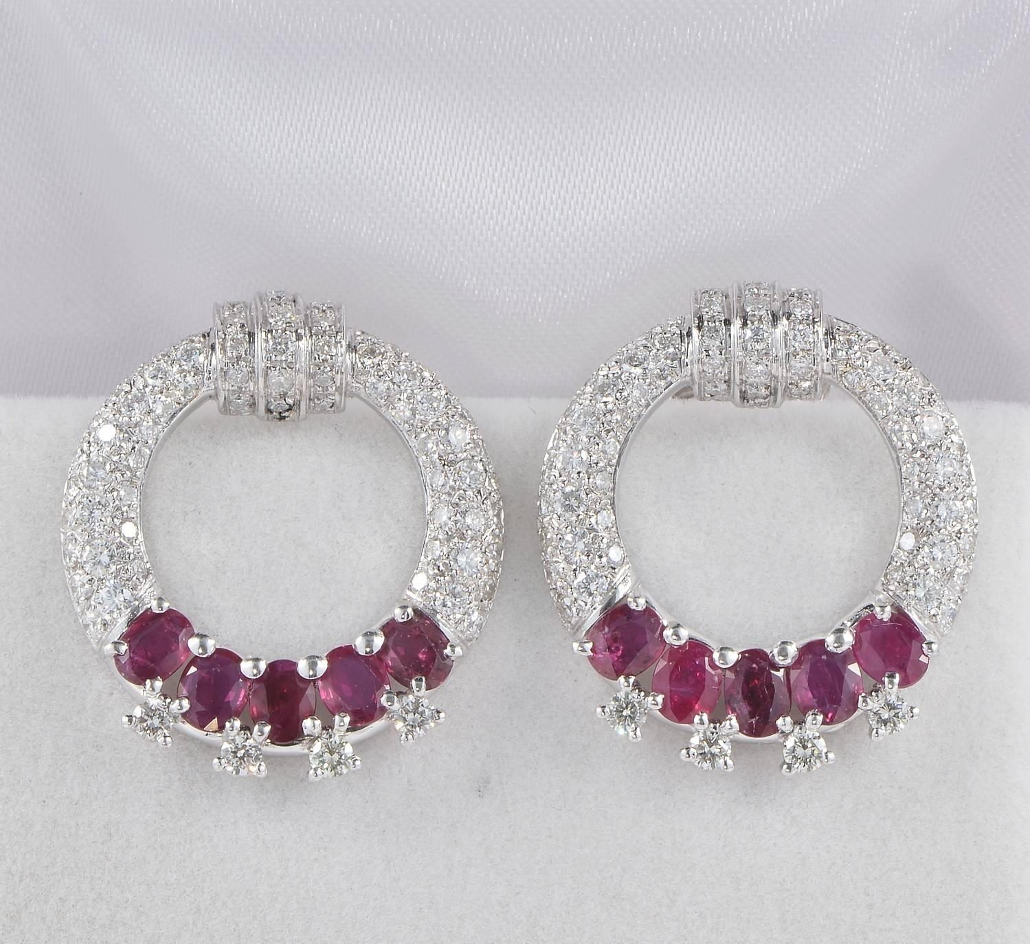 Reduced!
One off pair of vintage earrings set with natural Ruby & Diamond in contrast.
Sophisticate in design beautifully modelled as wide hoops, with amazing colour contrast between natural Rubies and Diamond sparkle.
Hand crafted of solid 18 KT