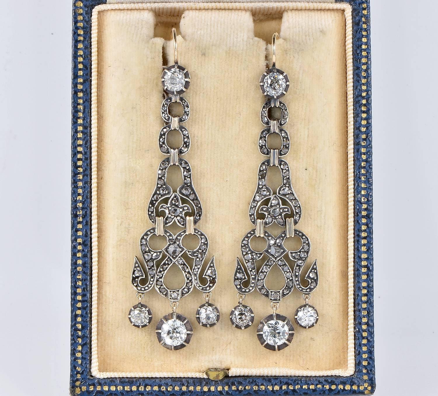 Top notch authentic Empire period long drop earrings. 
Rare and beautiful pair to get in any collection. 
Hand crafted during the period of solid 18 KT gold with topped by silver - not marked.
Fantastic interlaced panel work totally surmounted by