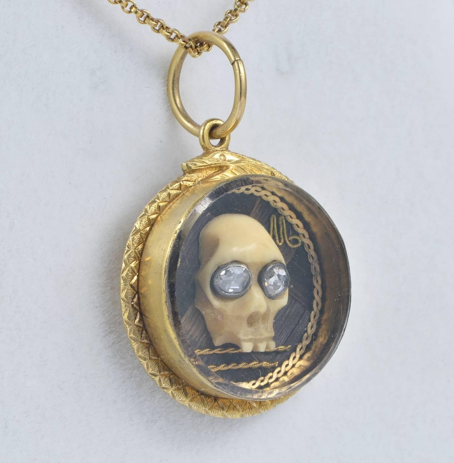 memento mori gold pendant
