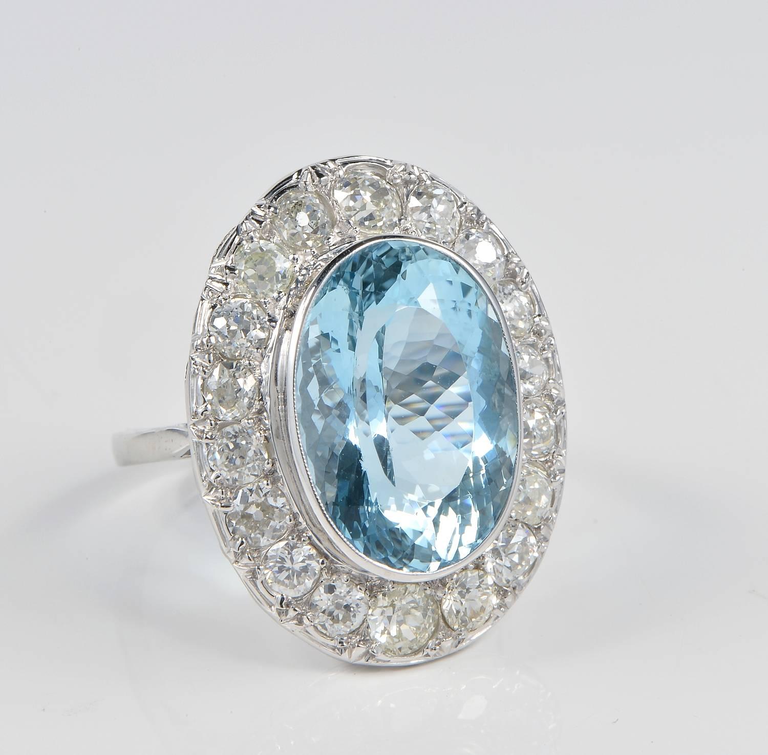 Art Deco heirloom ring set with large intense Blue natural Aquamarine and opulent content of old mine cut Diamonds high on the scale
Hand crafted of solid Platinum during 1920 ca – not marked 
Spectacular ring!
Beautiful mounting, finely detailed