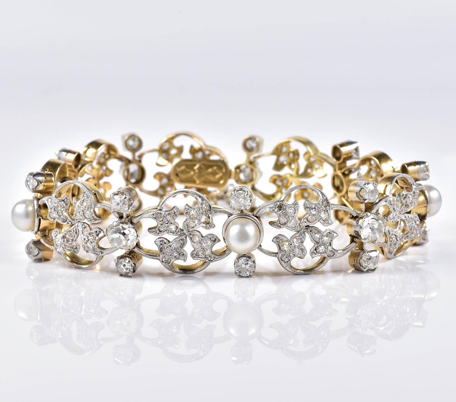 Rare Art Nouveau Bracelet of distinctive floral design, 1895 ca. 
Crafted of 18 KT gold topped by Platinum
Set with 9.50 CT of old mine cut Diamonds and natural sea pearls from the Persian Gulf.
Excellent condition

Art Nouveau design distinguish