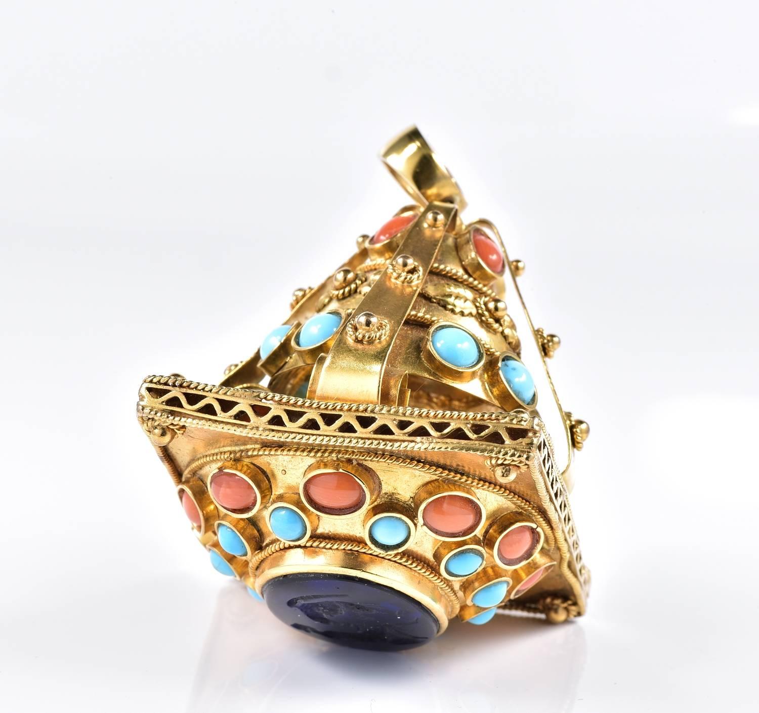 One of a kind Victorian period fob pendant, 1880 ca.
Gigantinc in size not easily seen, boasting magnificent solid 9 KT gold workmanship of the period.
Designed in a revival of the Etruscan style beautifully enriched with coral and turquoise