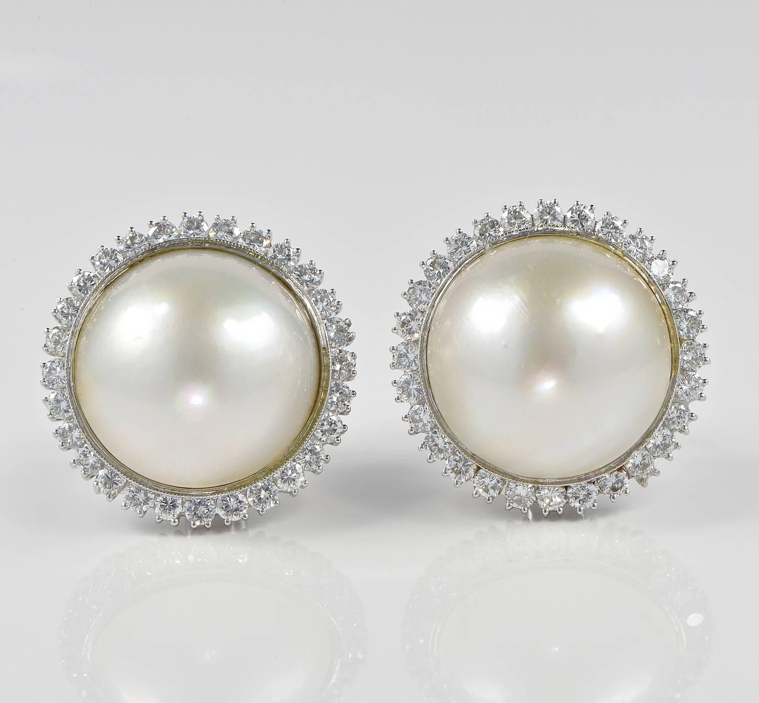 Spectacular classy pair of large sized Mabe Pearl complemented by halo of best Diamonds
Everlasting pair to wear at any occasion, the favourite style by Lady D
Quality all round, precious hand workmanship boasting 2.60 Ct of G VVS/VS Diamonds 17 mm.