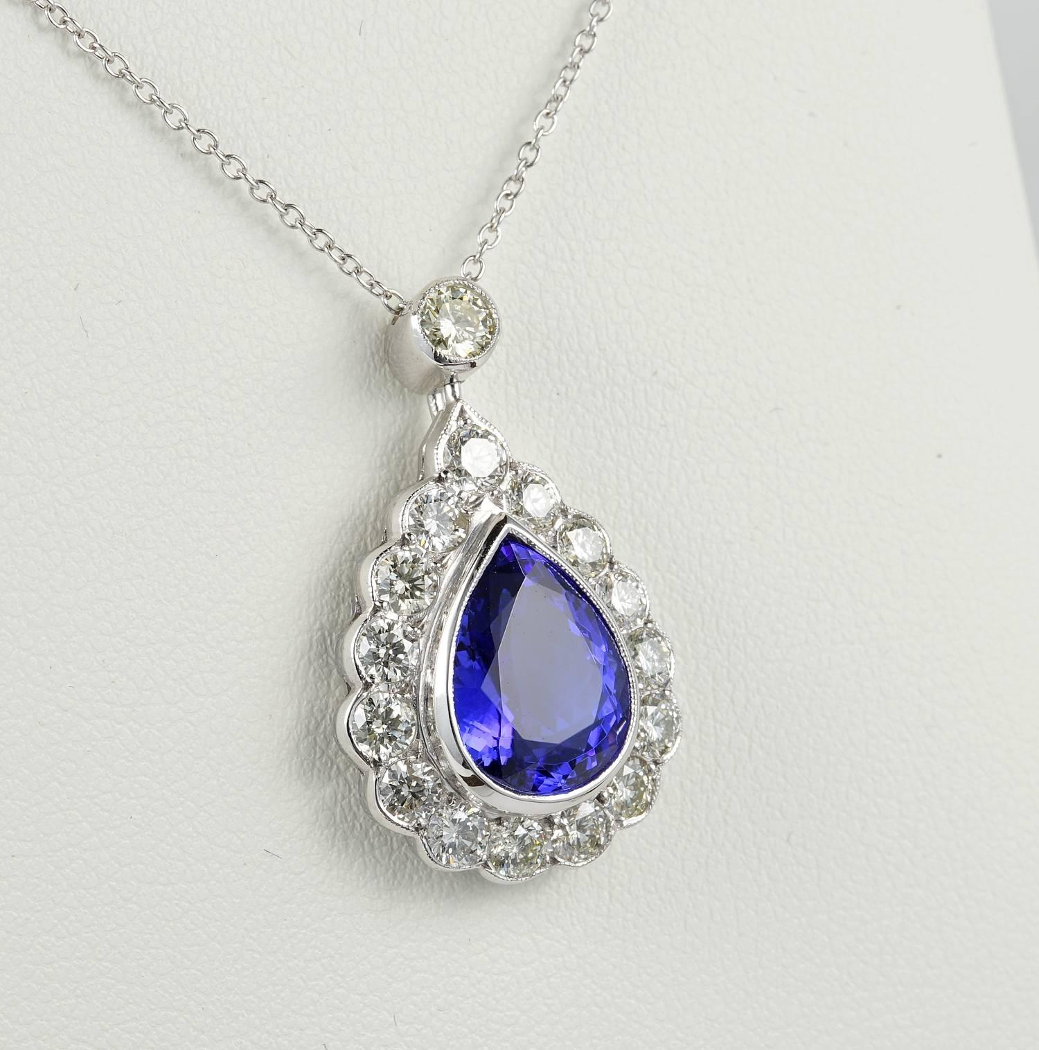 Spectacular quality Royal intense vivid Blue with splashed of purple 4.80 Ct Tanzanite which is a beauty
Pear cut mounted in Platinum with a complement of round brilliant cut Diamonds for 2.30 Ct rated as G/H VVS/SI.
Magnificent presence, dazzling