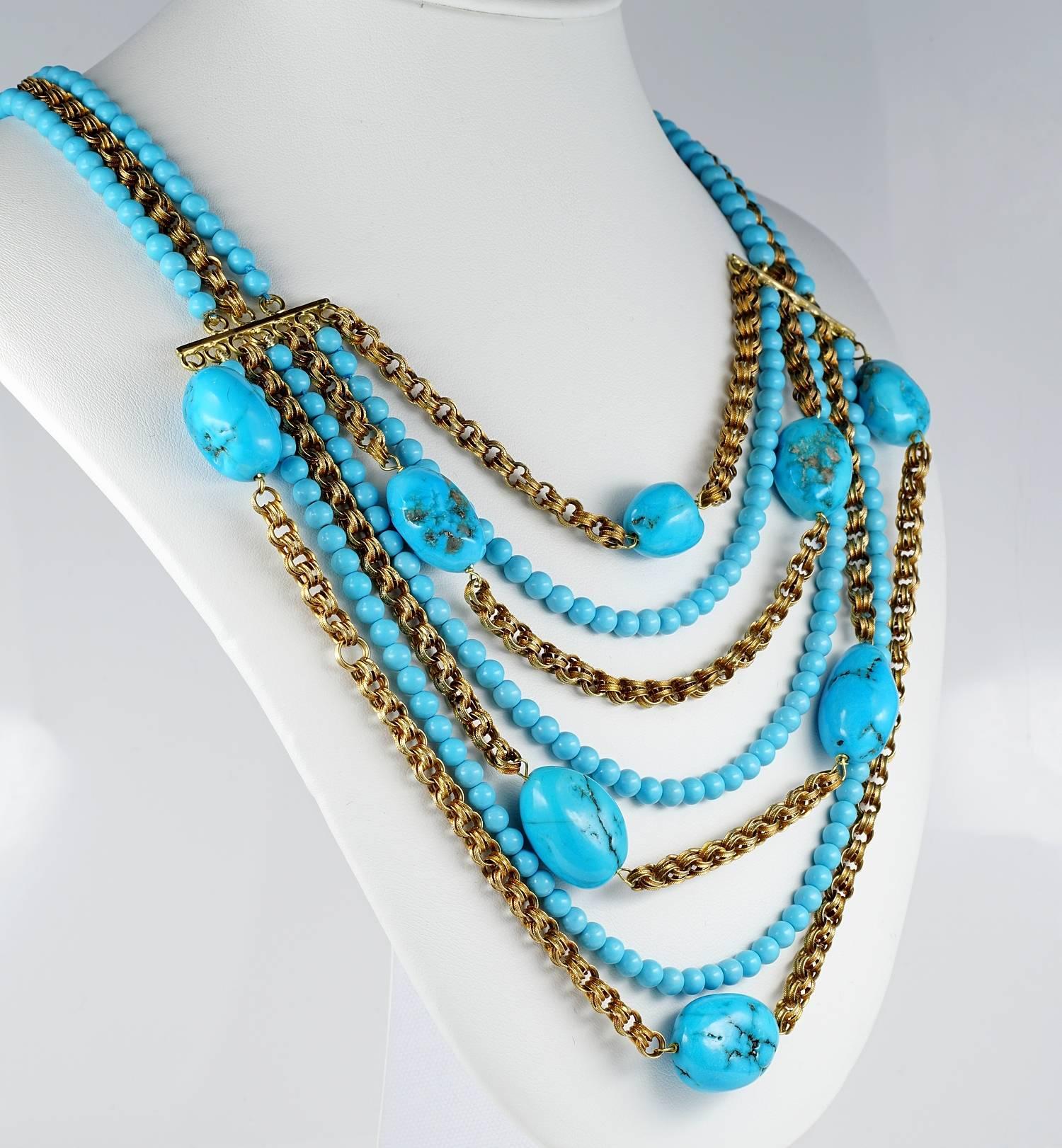A fine set made of natural Turquoise beautifully mounted in 18 KT solid gold multistrand set comprising necklace and bracelet
Charming chic composition made out of distinctive links gold chains mixed up with nuggets of Natural Turquoise and strands