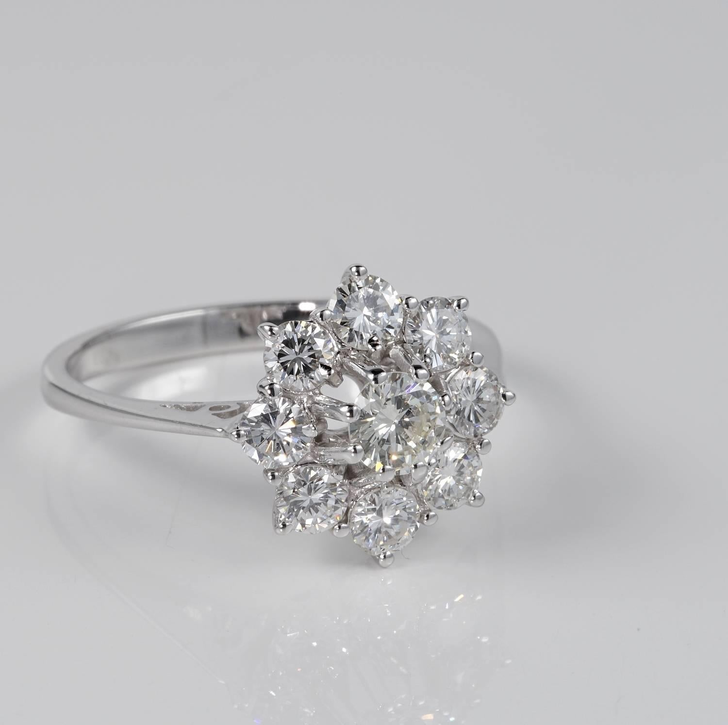 A dreaming and high quality Diamond cluster ring set throughout with extremely fine round brilliant cut Diamonds
rated as G VVS for a total content of 1.45 Carat
Diamonds project an amazing amount of sparkle thank to the great quality either