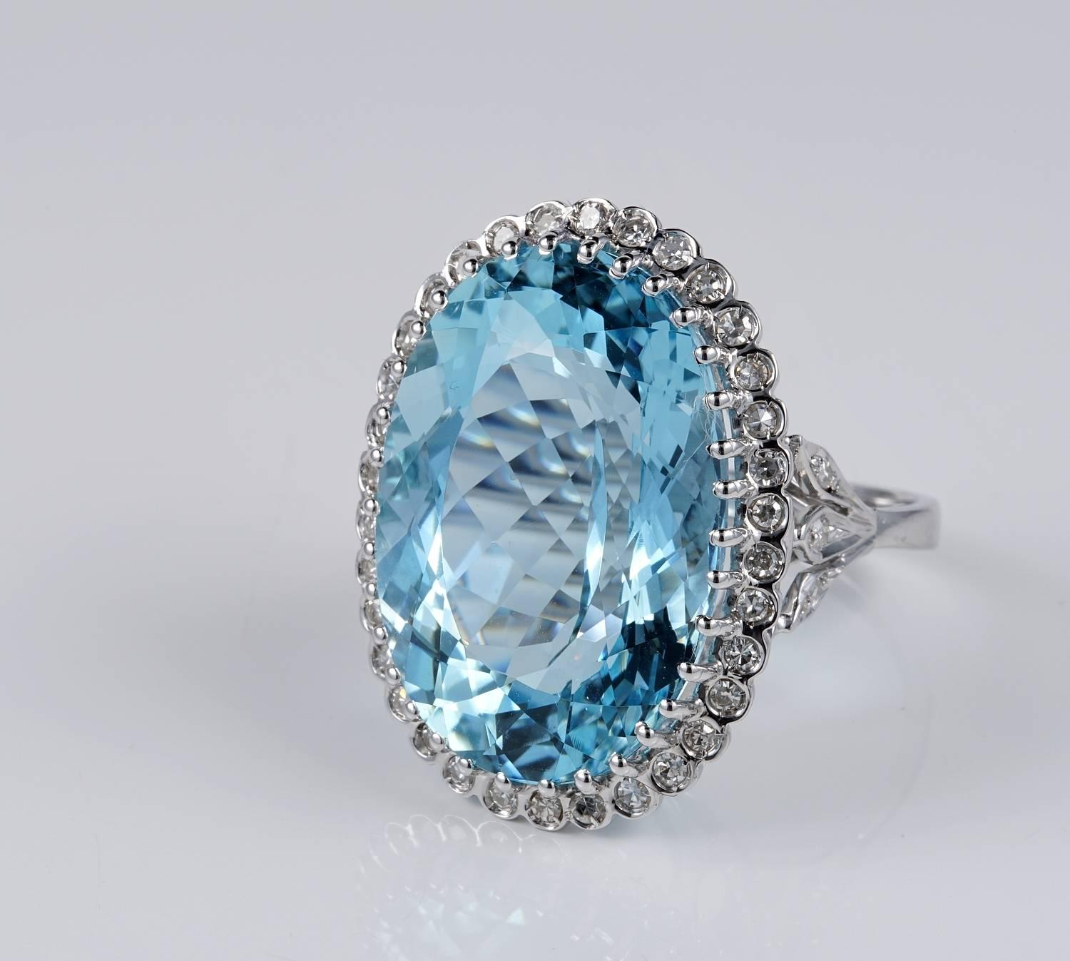 Contemporary 27.0 Carat Intense Blue Aquamarine 0.70 Carat Diamond Vintage Ring For Sale