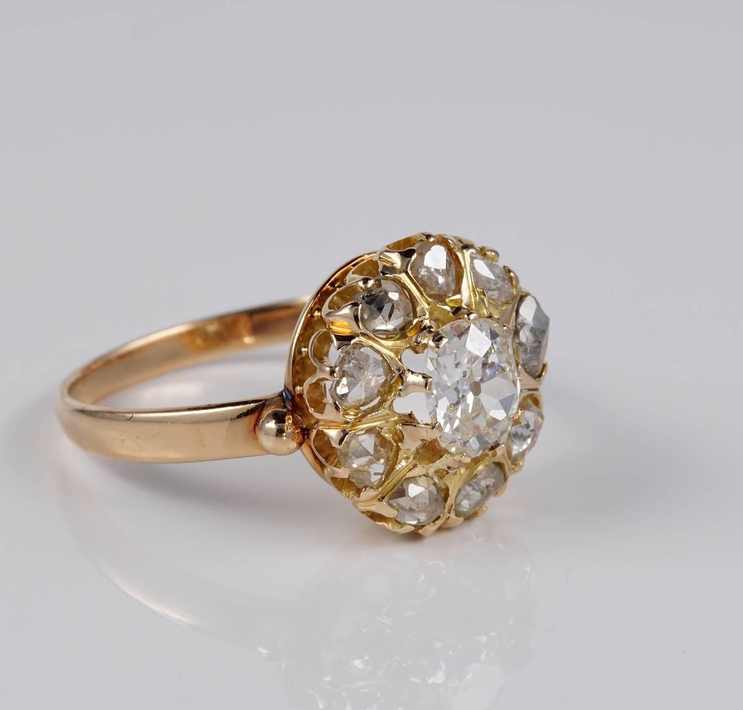 A traditional Victorian period Diamond cluster ring
Exquisitely set with a centre old mine cushion cut of .65 Ct rated as G/VS
with a surrounding circle of rose cut Diamonds complementing the beautiful daisy cluster design
adding .90 Ct of more