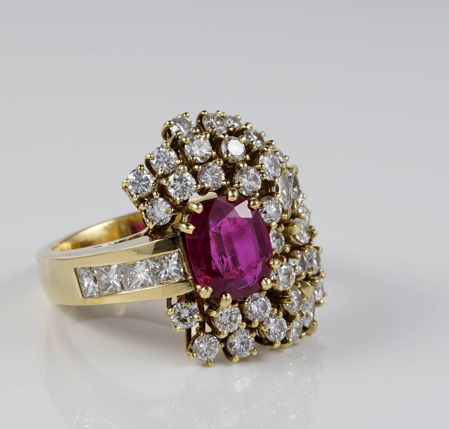 An impressive vintage ring of striking Bombe' style set with rare Ruby and lots of Diamonds
Italin origin, 1950 ca
Hand craftedof solid 18 Kt gold, marked. Weight is 16.3 grams
Centrally set with a rare Natural Ruby Siam origin - No Heat -