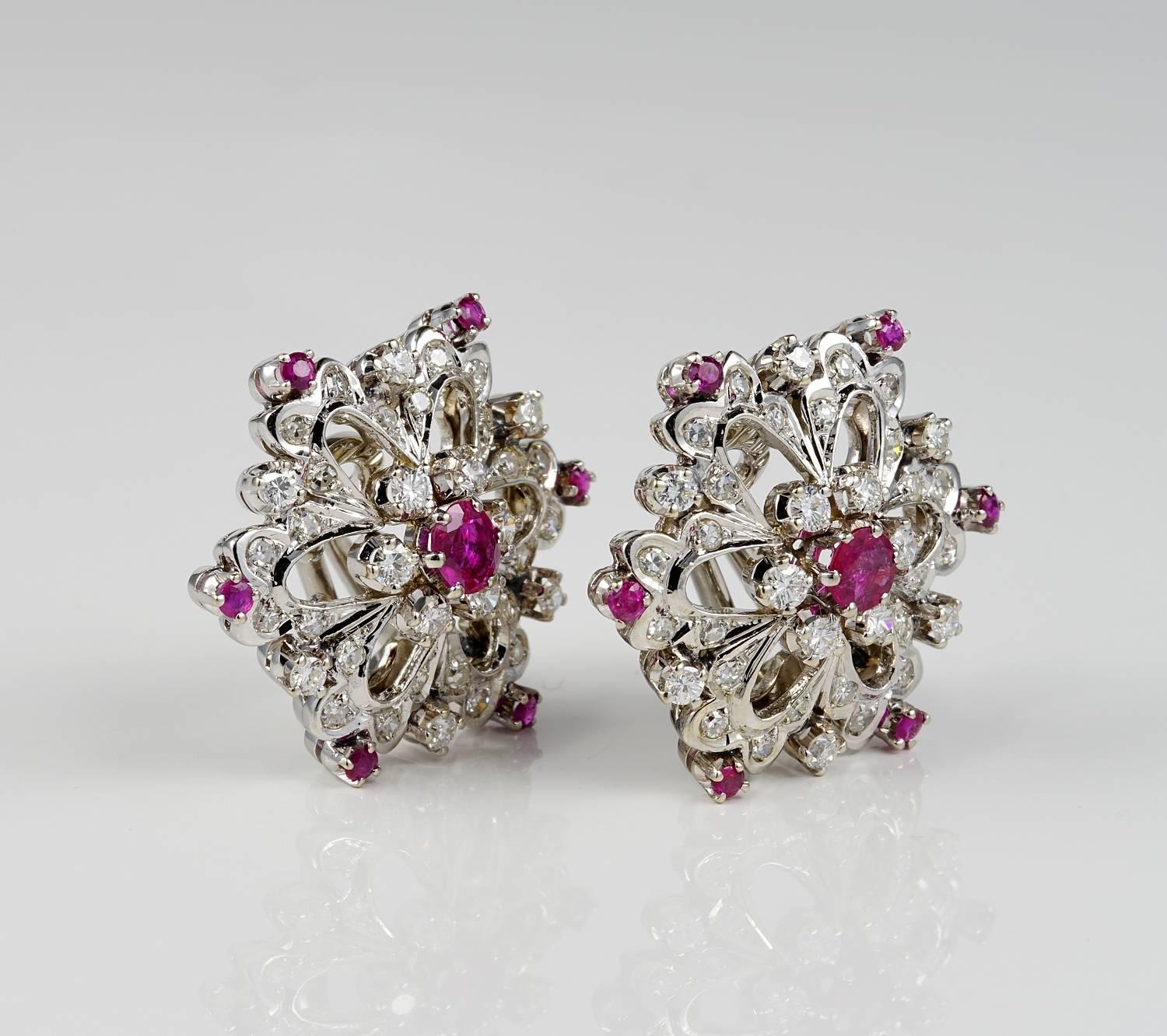 Reduced!

A one off pair of 1950 vintage earrings skilfull hand crafted as unique flower with exceptional pierced work and rare design
Italian origin, made of solid 18 Kt white gold
Set throughout with 1.95 Ct of bright white quality Diamonds rated