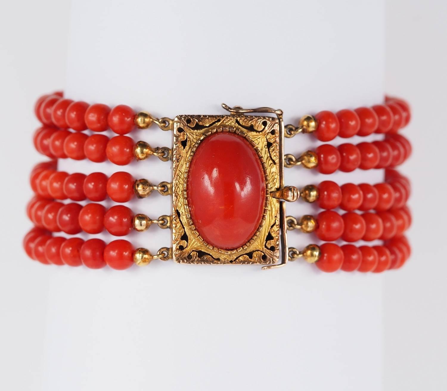 Beautiful authentic Victorian (1870 ca) bracelet. Italian origin.
Set with rare variety of deep Red natural Coral, untreated OX Blood colour.
With a sensational centre piece of large Coral cabochon mounted in 14 KT solid gold, marked.
Fine detailed,